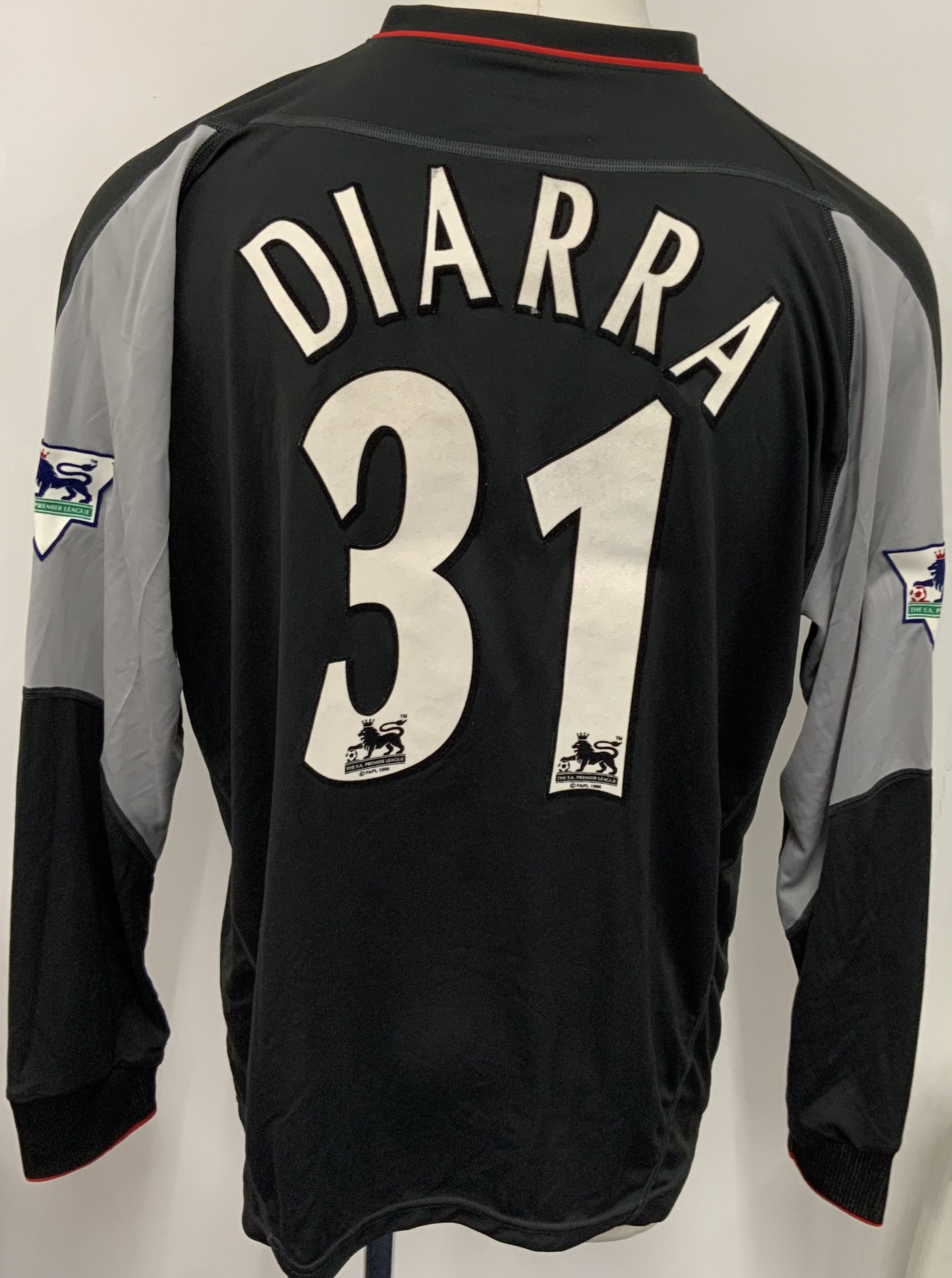 Liverpool 2002 - 2003 Match Issued Football Shirt: Black long sleeve shirt with Premier League badging to sleeves. Diarra 31 to rear. 