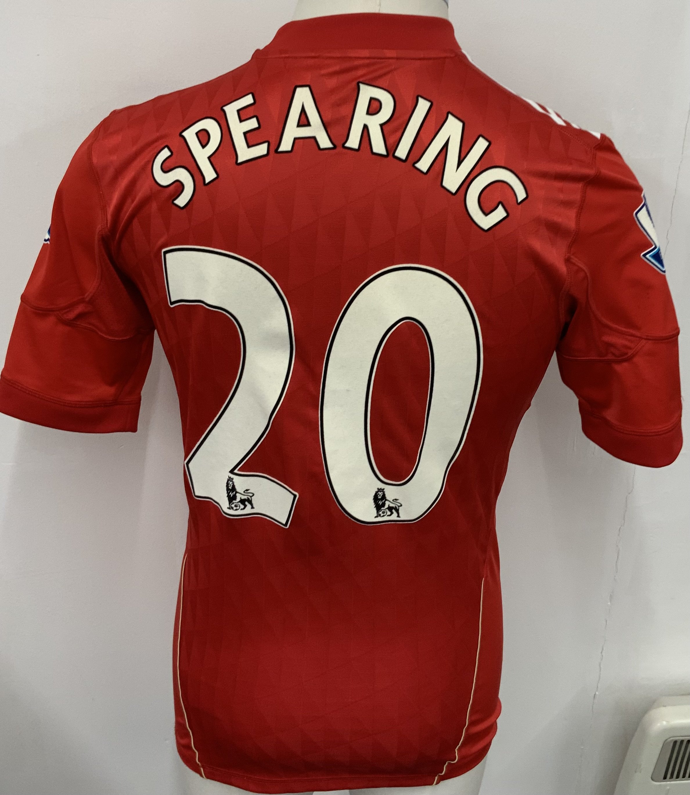 Liverpool 2011 - 2012 Match Worn Football Shirt: Red short sleeve shirt with Premier League badging to sleeves. Spearing 20 to rear. 