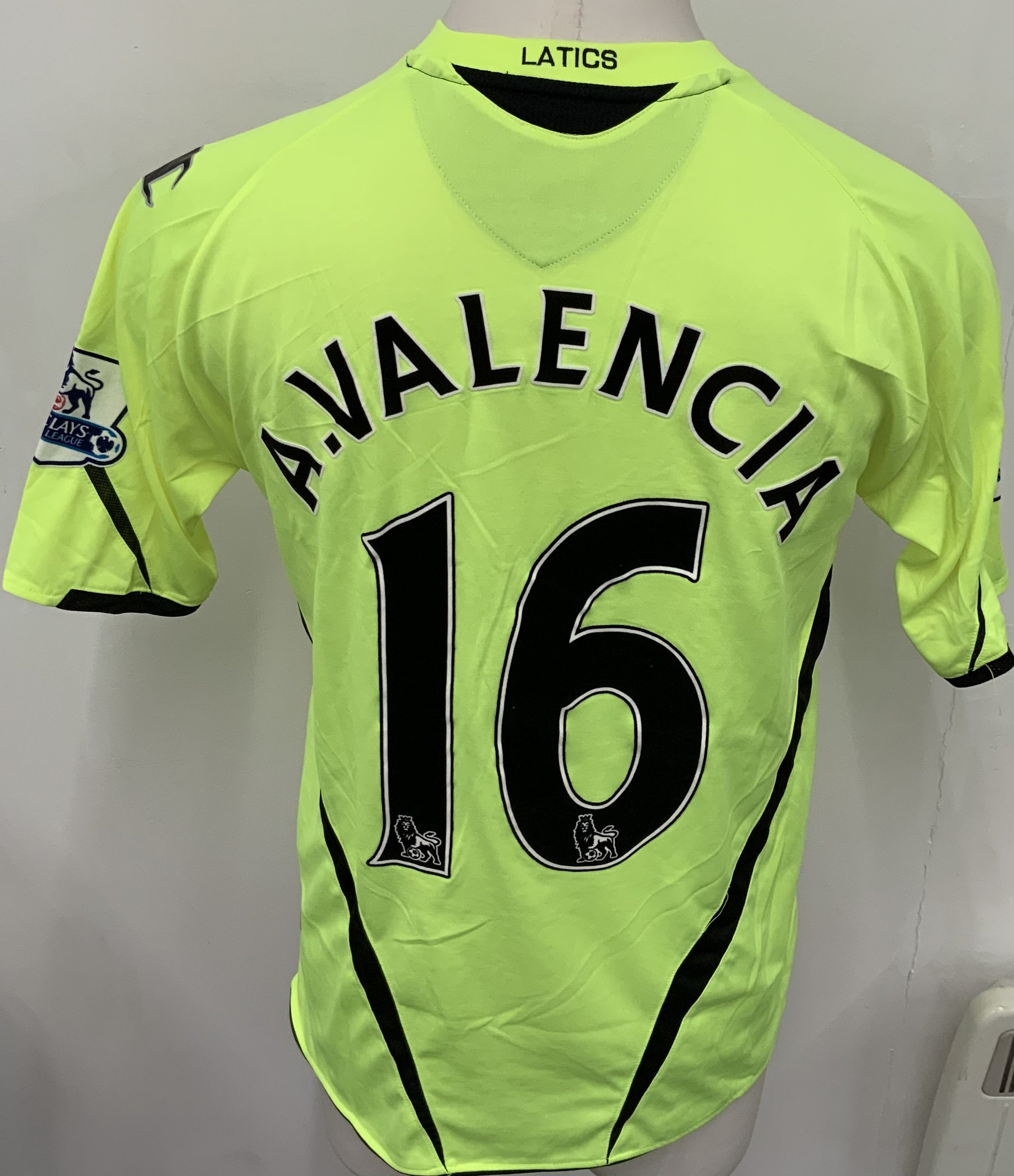 Wigan Athletic 2008 - 2009 Match Worn Football Shirt: Yellow short sleeve shirt with Premier League badging to sleeves. Number 16 A Valencia to rear. 