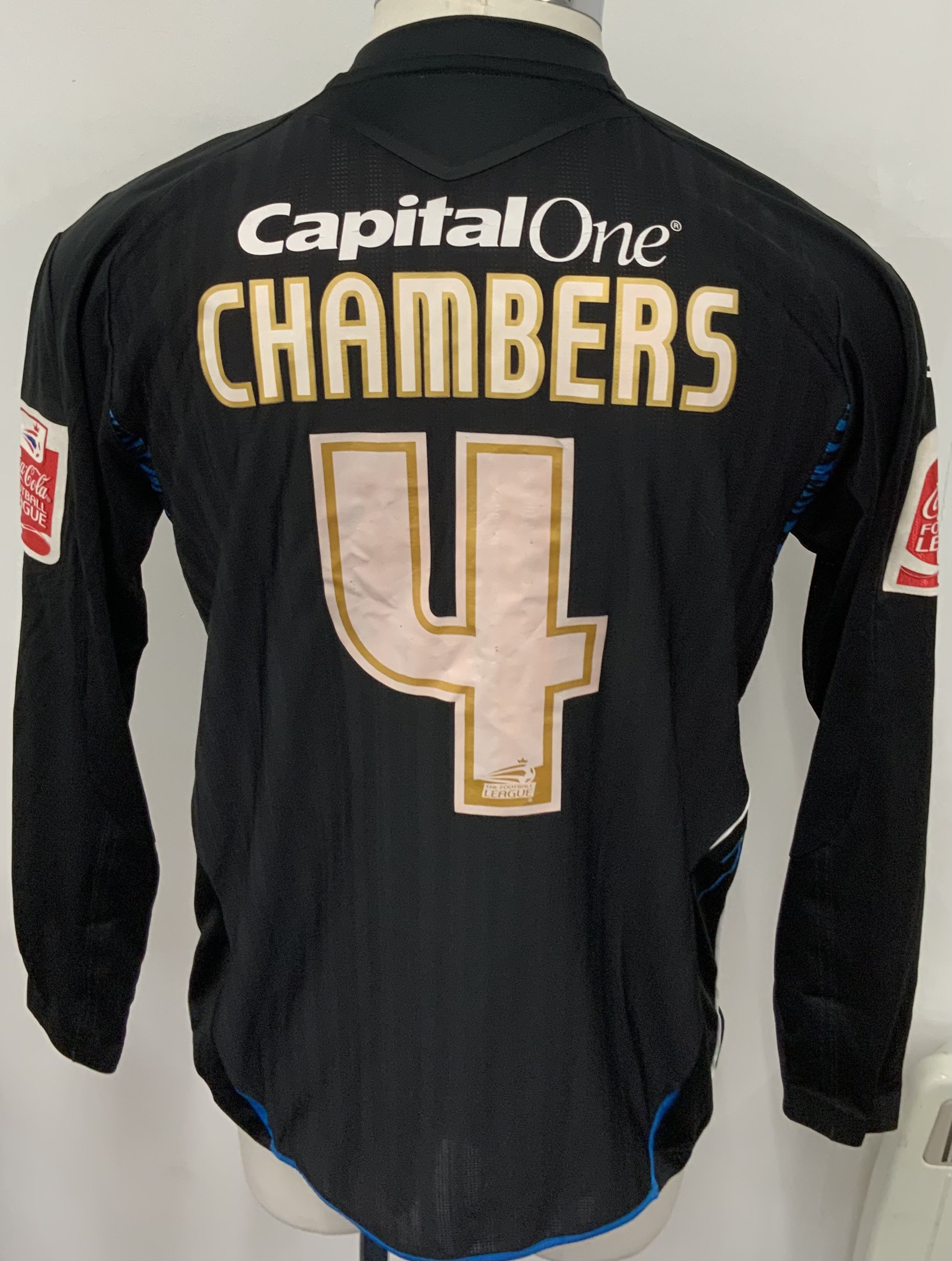 Nottingham Forest 2007 - 2009 Match Worn Football Shirt: Black long sleeve shirt with Coca Cola Football League badging to sleeves. Chambers 4 to rear. 