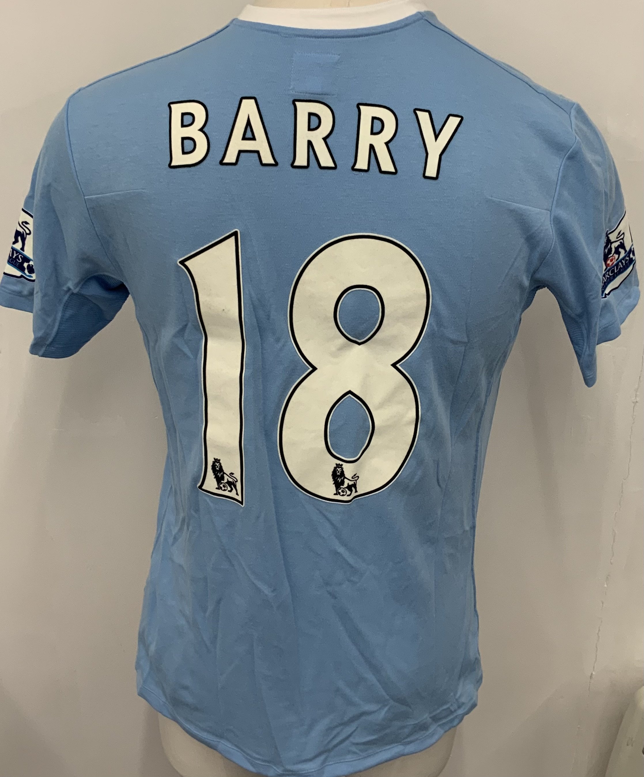 Manchester City 2009 - 2010 Barry Match Worn Football Shirt: Blue short sleeve Umbro shirt from 1st season of Etihad Sponsorship. Premier League badging to sleeve and Barry 18 to rear. 