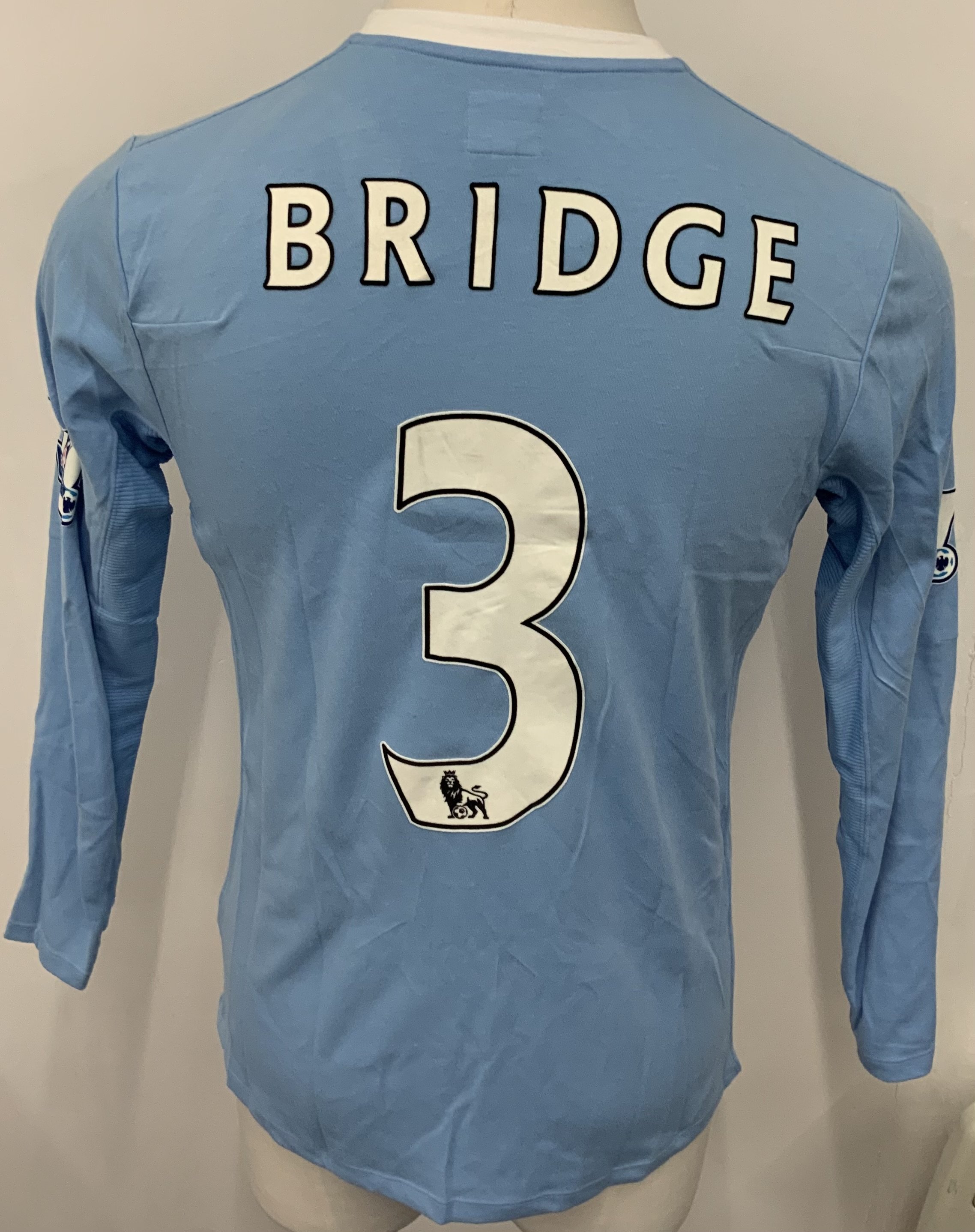 Manchester City 2009 - 2010 Bridge Match Worn Football Shirt: Blue long sleeve Umbro shirt from 1st season of Etihad Sponsorship. Premier League badging to sleeve and Bridge 3 to rear. 