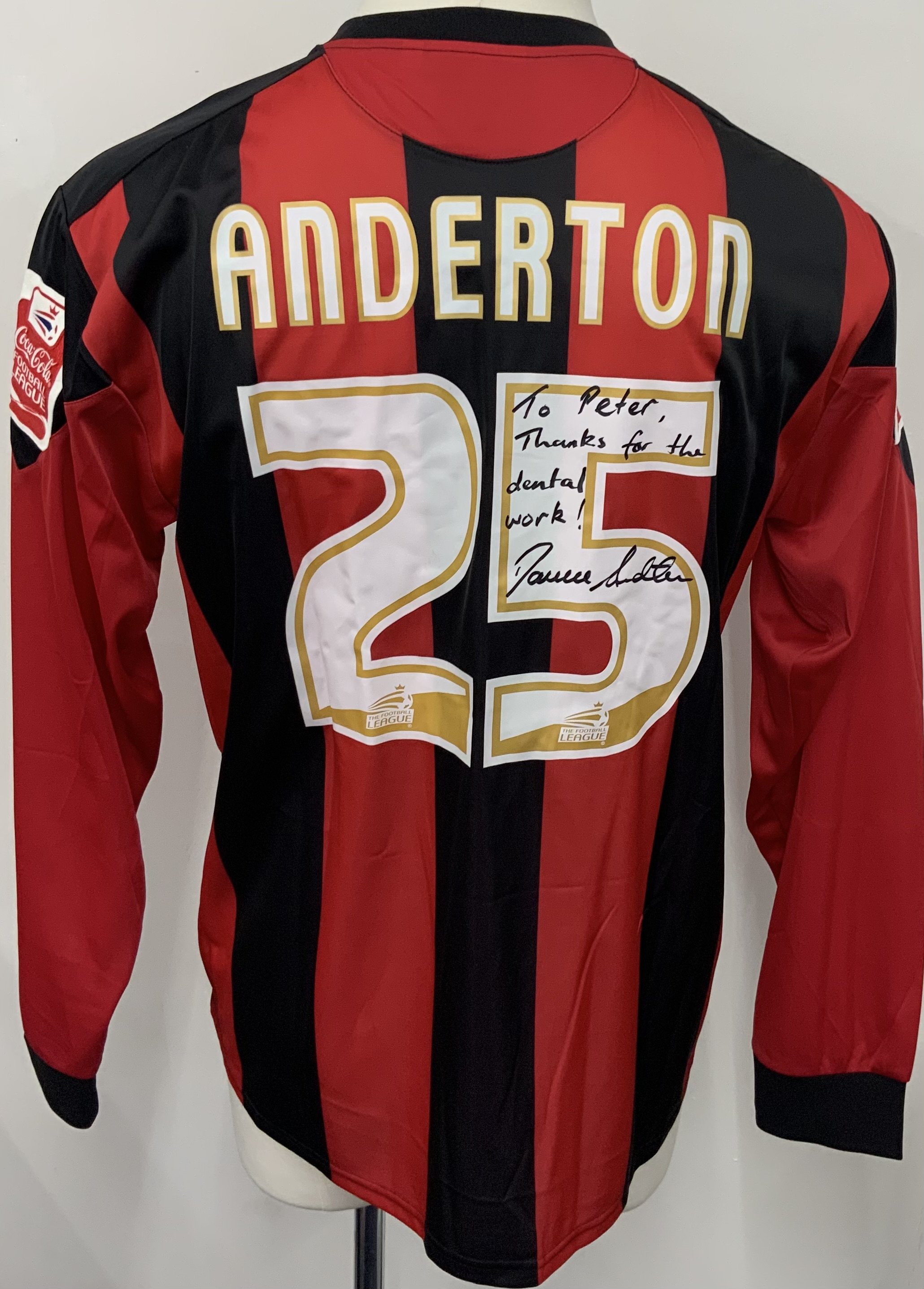 Bournemouth 2006 - 2007 Match Worn Football Shirt: Red and Black striped long sleeve shirt. Number 25 Anderton to rear. Signed with dedication. 