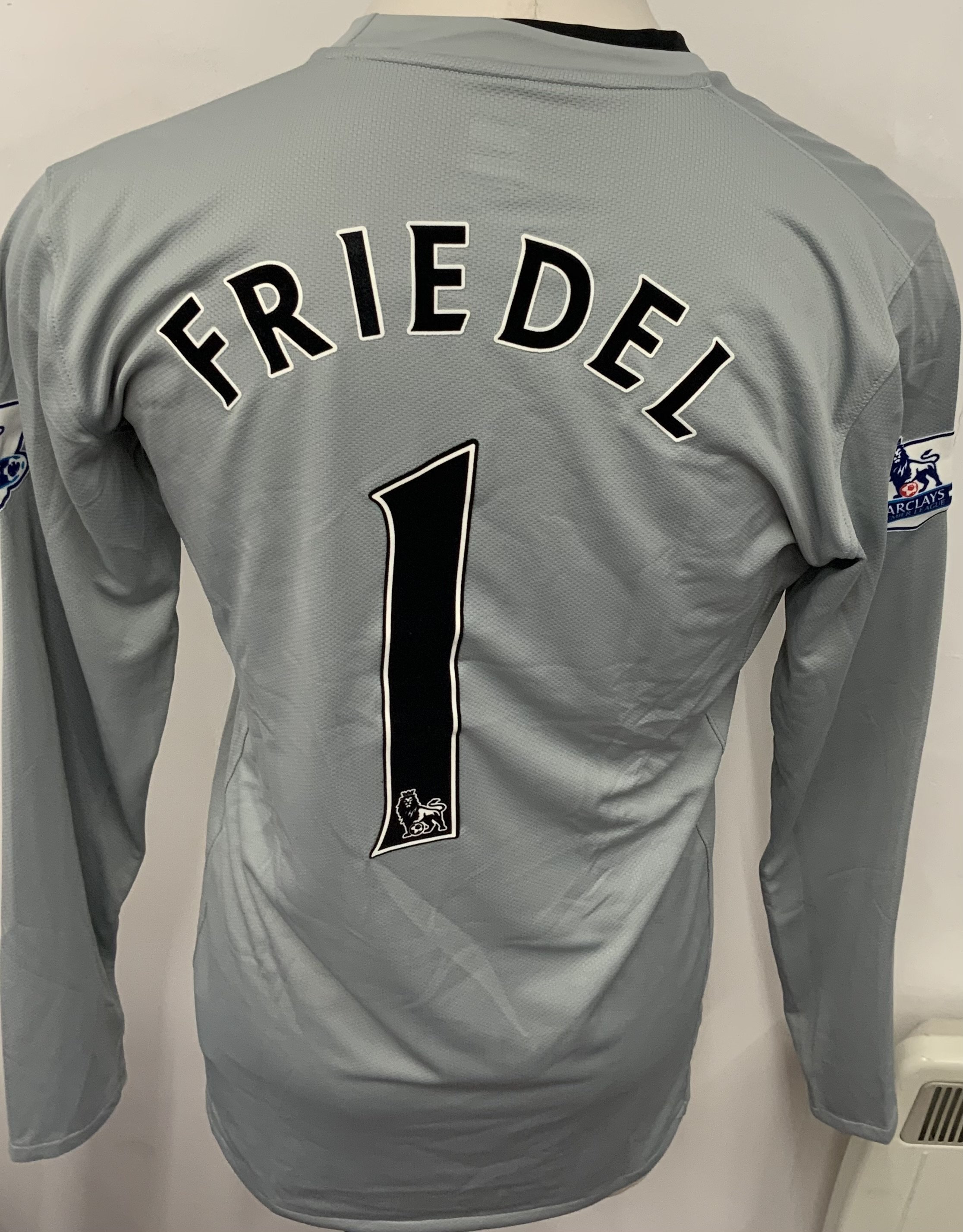 Aston Villa 2008 - 2009 Match Worn Goalkeepers Football Shirt: Grey long sleeve goalkeepers shirt. Number 1 Freidel. Premier League badging. Signed with dedication. 