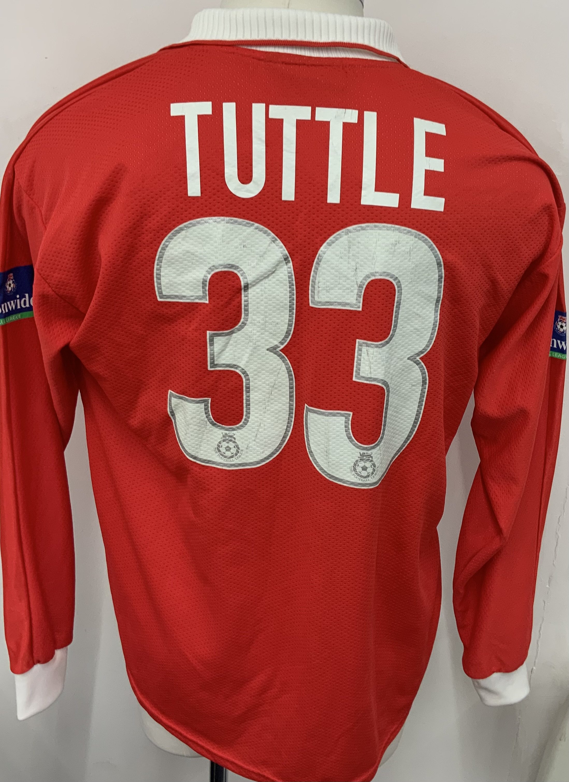 Barnsley 1999 - 2000 Match Worn Football Shirt: Red long sleeve shirt. Number 33 Tuttle.  Nationwide League  badging. 