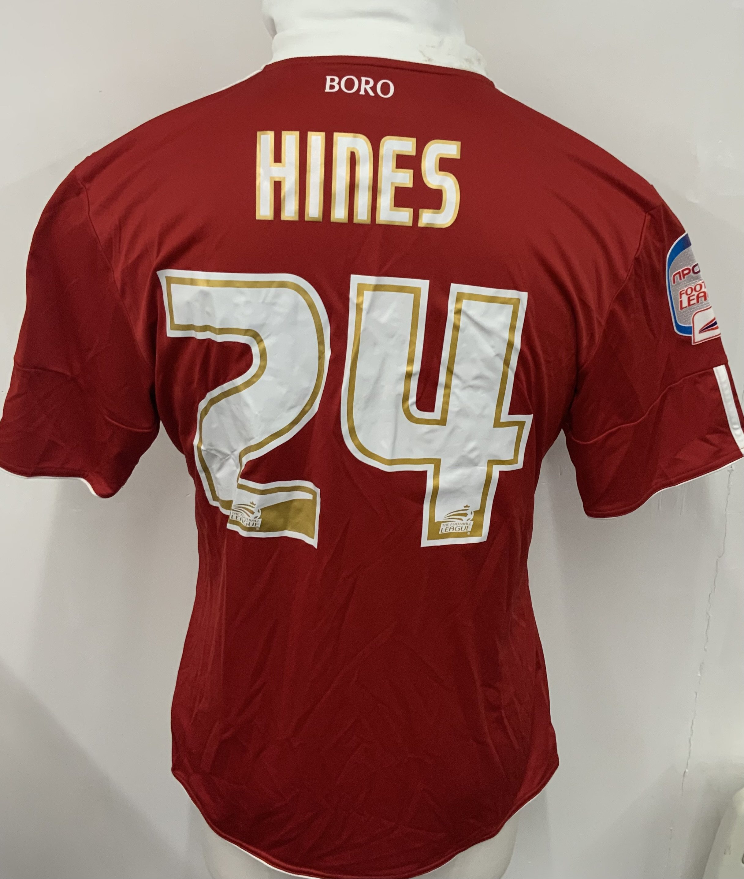 Middlesbrough 2010 - 2011 Match Worn Football Shirt: Red short sleeve shirt. N Power League badging to sleeves. Hines 24 to rear. Shirt is unwashed. 