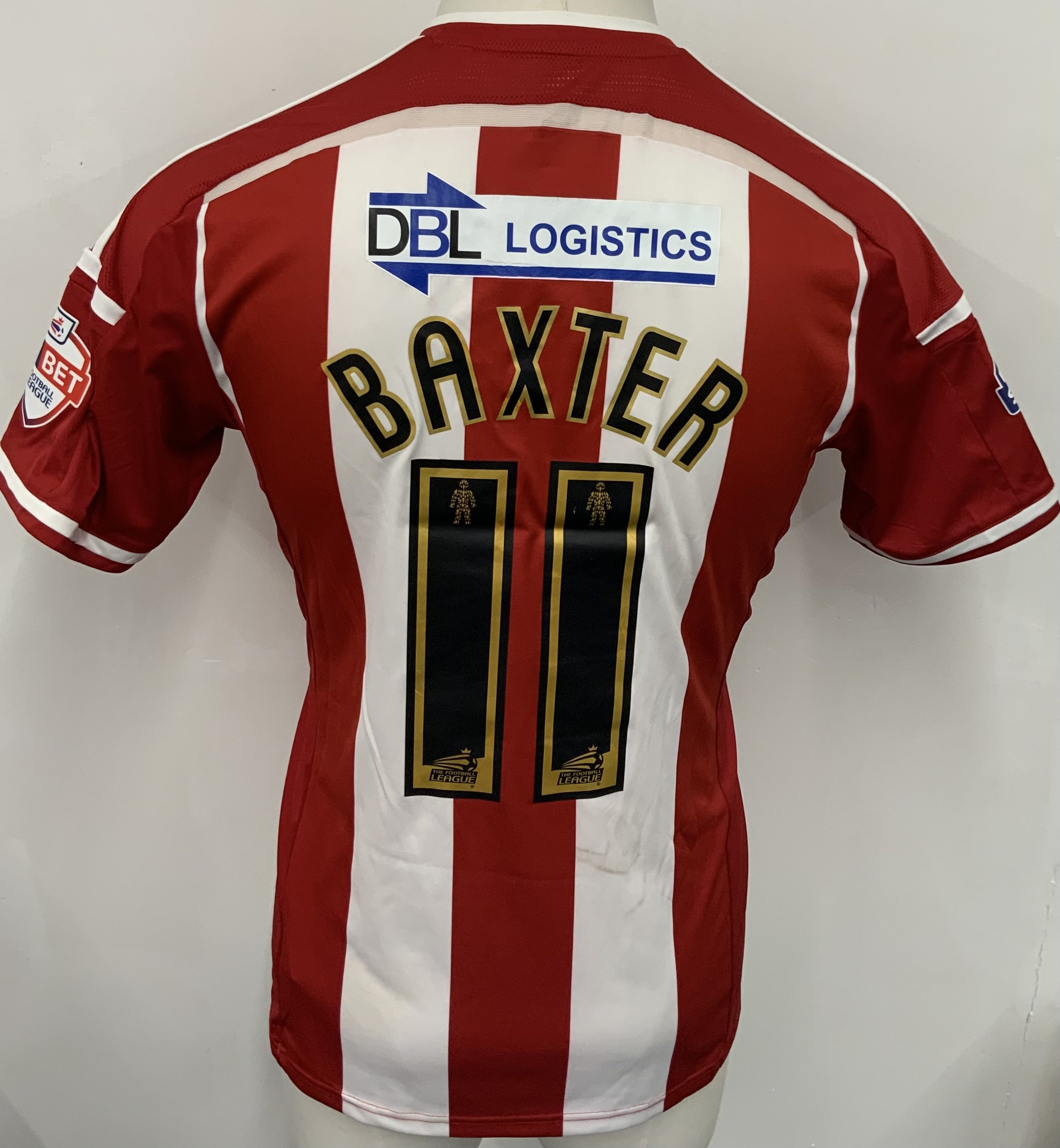 Sheffield United 2014 - 2015 Match Worn Football Shirt: Red and white short sleeve shirt. Number 11 Baxter. Sky Bet badging. Worn v West Ham on 26 August 2014 in the League Cup. Sheffield got to the semi final that season. 