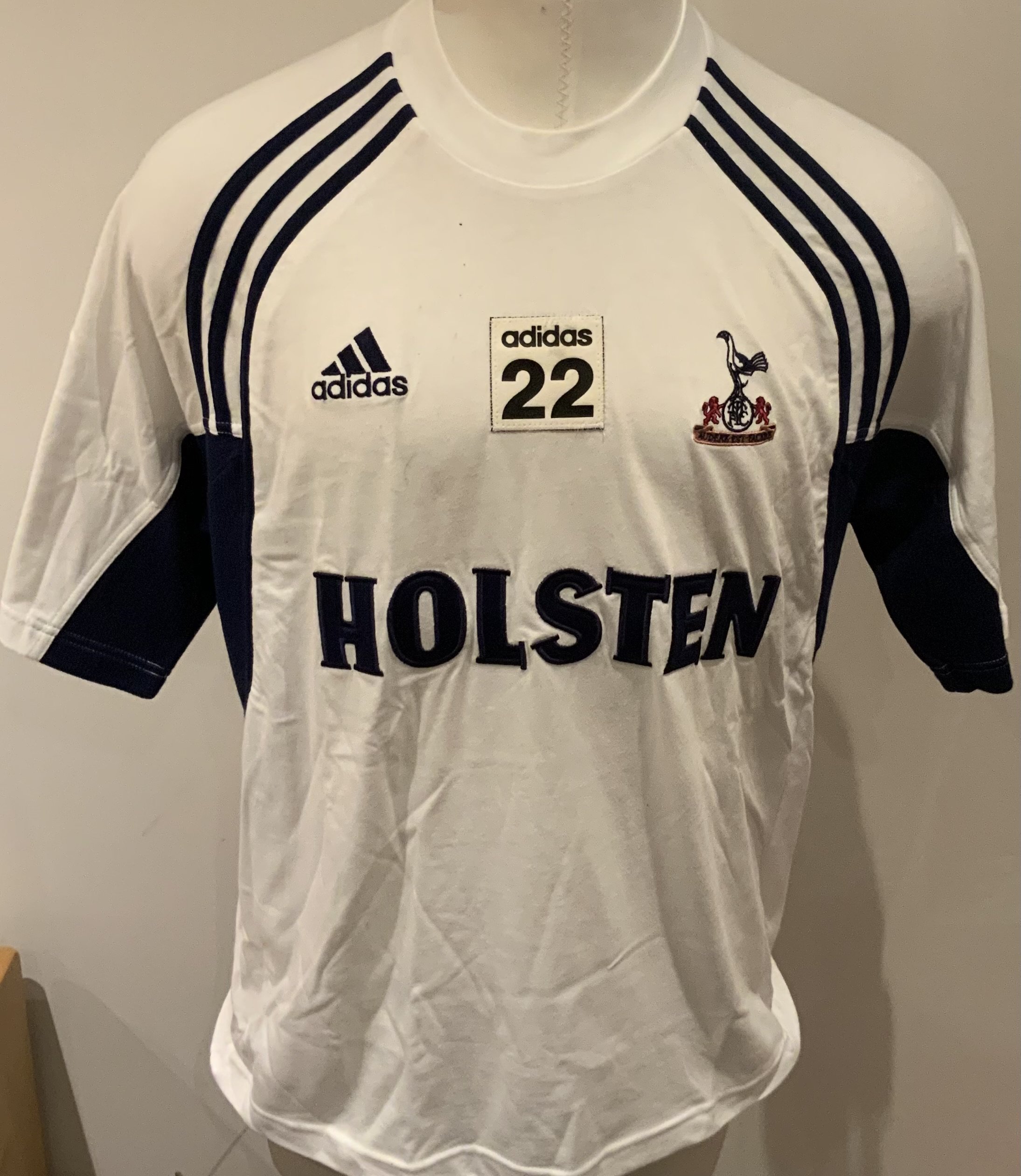 Tottenham 2001 - 2002 Football Players Training Kit: Number 22. Comprises of one blue and one white Adidas  Holsten tee shirt. (2)