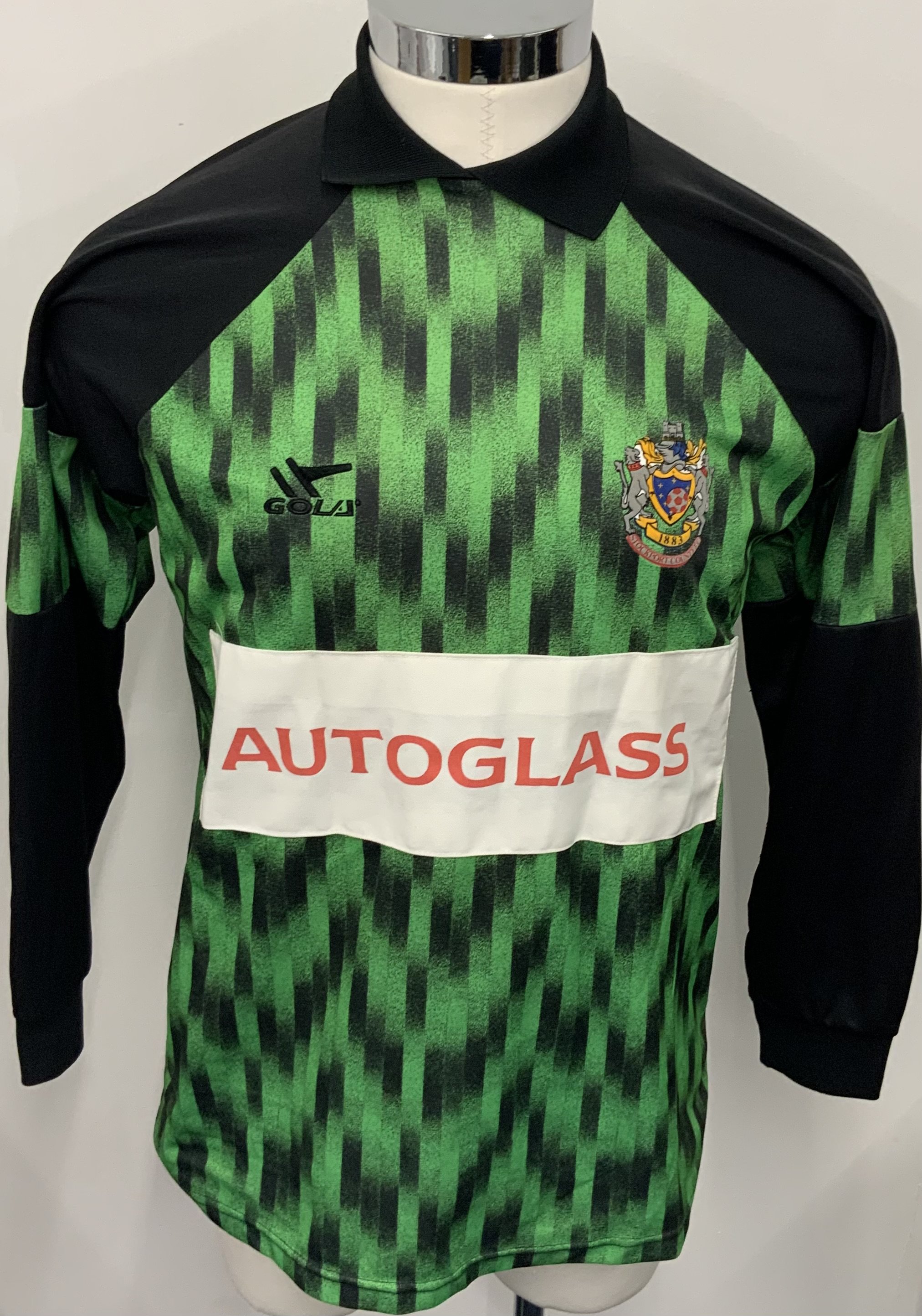 Stockport County 1991 - 1993 Match Worn Goalkeepers Football Shirt: Green and black long sleeve Gola Autoglass sponsored shirt. Number 1 to rear. We are informed this is match worn but we believe Autoglass sponsor maybe a youth team sponsor. 