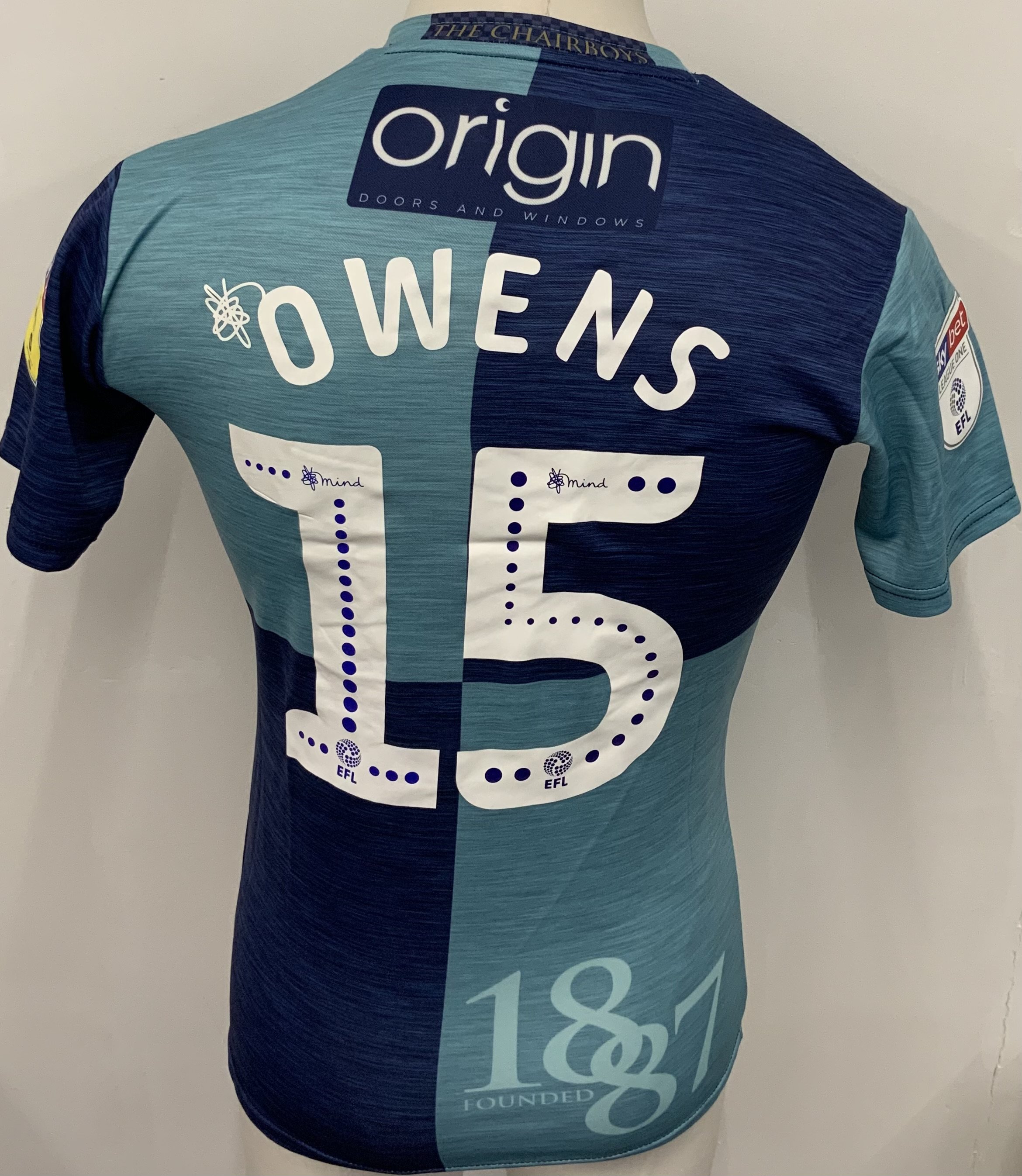 Wycombe Wanderers 2018 - 2019 Match Worn Football Shirt: Blue Quartered short sleeve shirt. Number 15 Owens to rear. Sky Bet League One badging. 