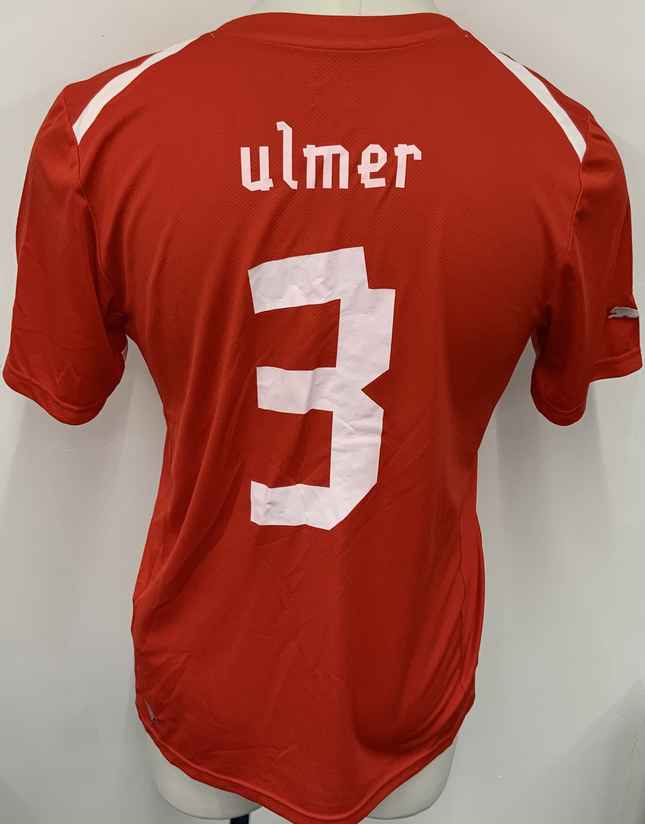 Austria 2011 Match Worn Football Shirt: Red short sleeve shirt. Number 3 Ulmer. 