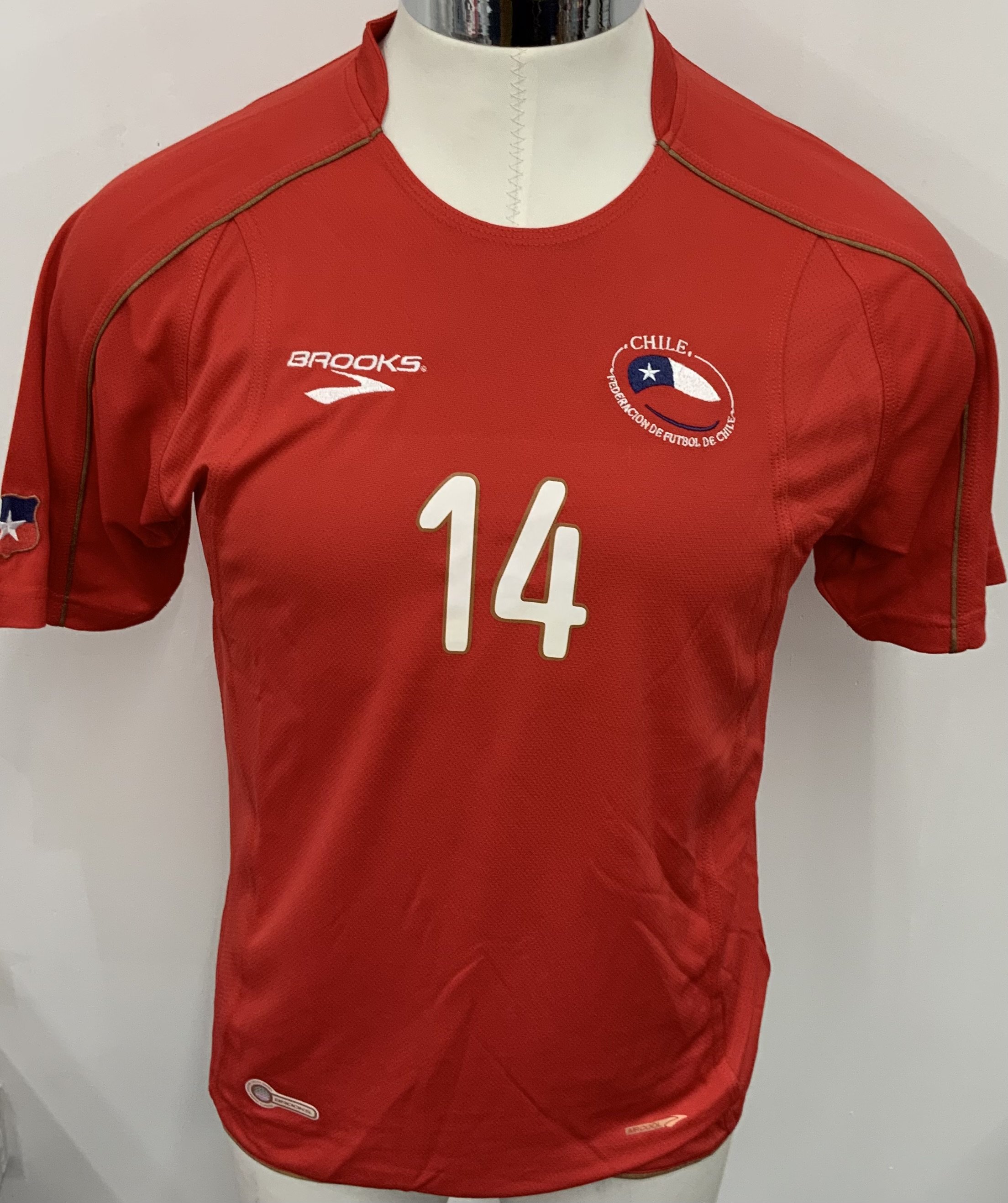 Chile 2010 Match Worn Football Shirt: Red short sleeve shirt. Number 14. Worn by Mathias Fernandez who started match v Northern Ireland on 30 May 2010. Chile won 1-0.