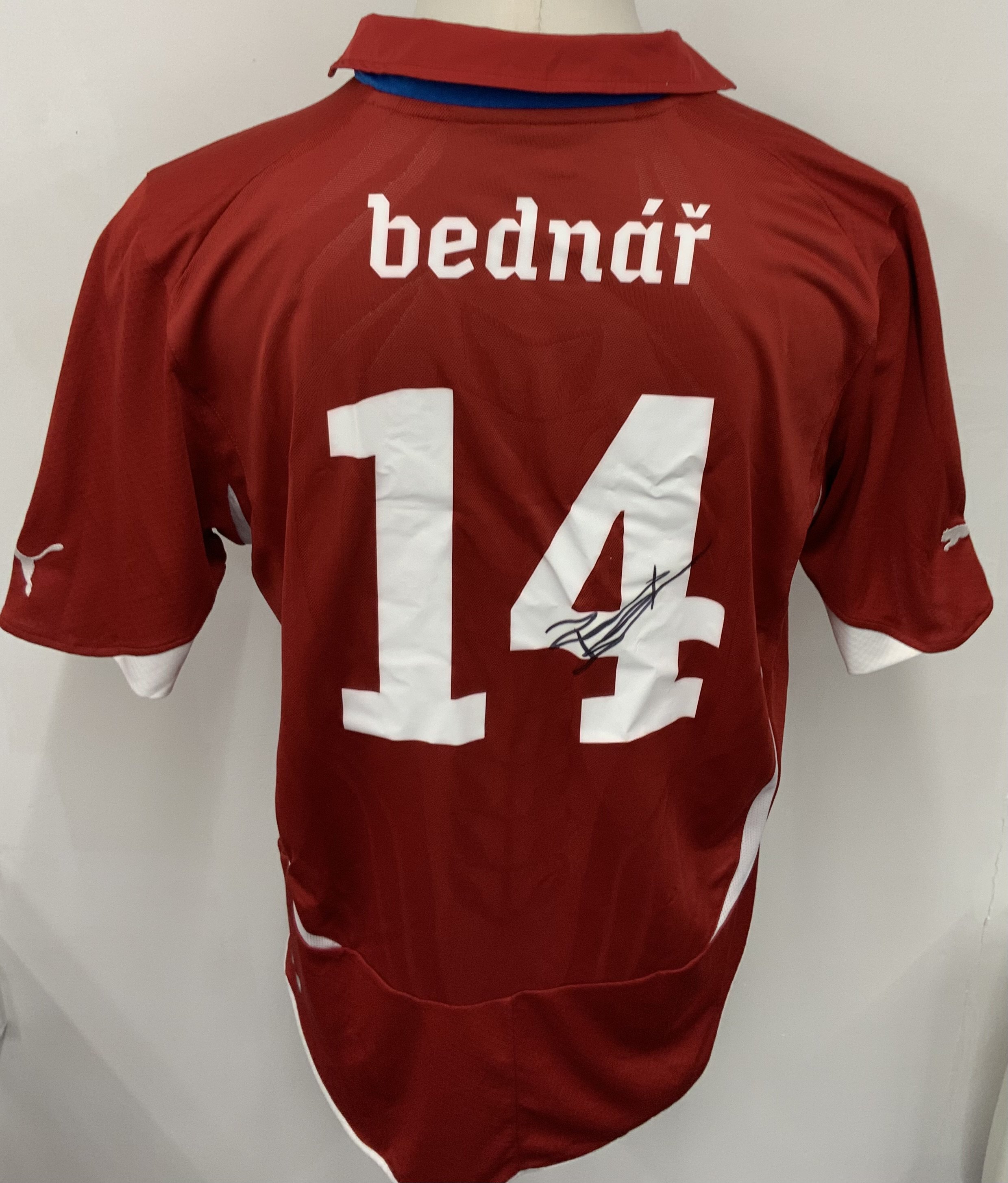 Czechoslovakia 2010 - 2011 Match Worn Football Shirt: Red short sleeve shirt. Number 14 Bednar. Shirt is signed by the player 