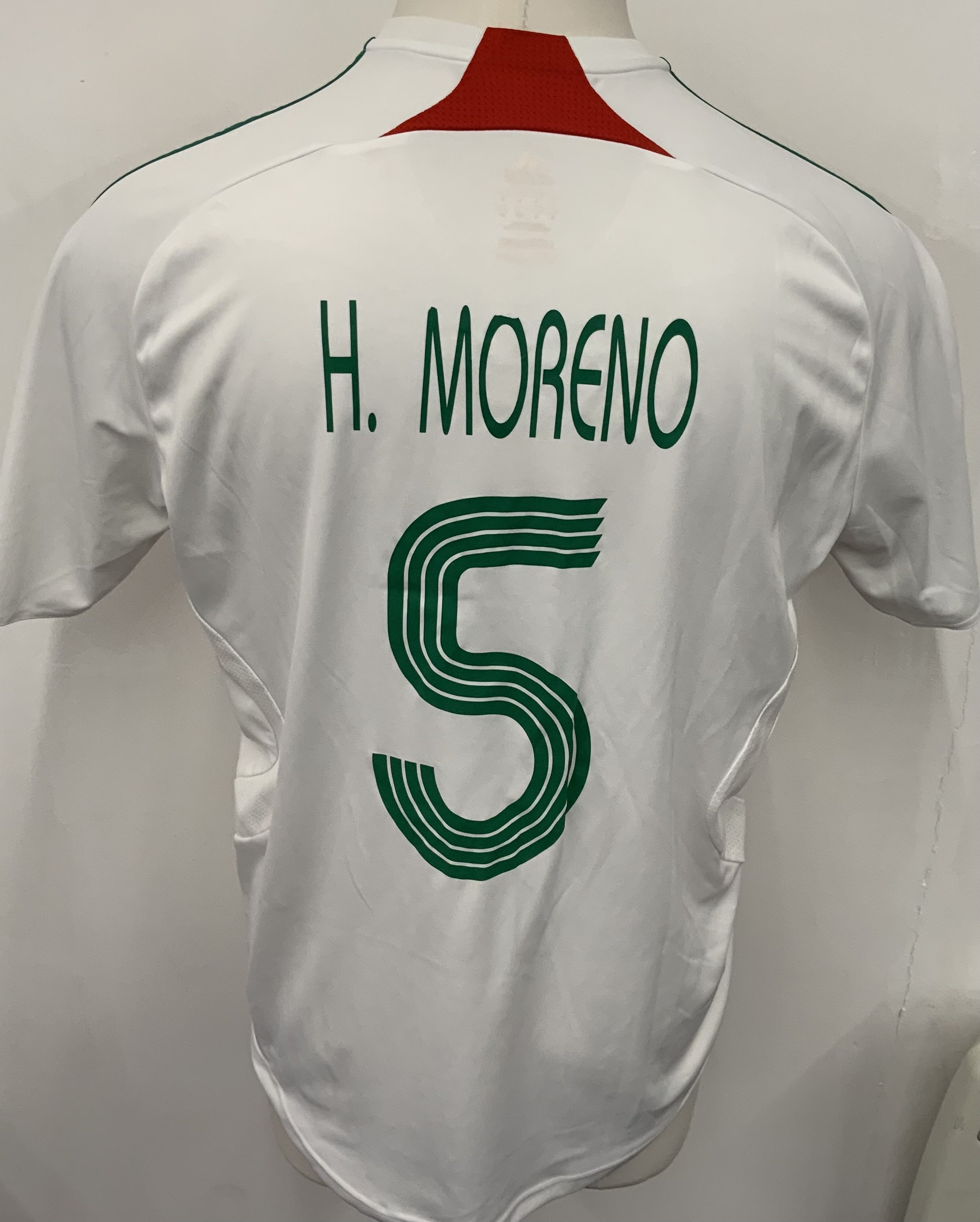 Canada 2007 Match Worn Football Shirt: White short sleeve shirt. Number 5 H Moreno. Worn during Under 20 World Cup in Canada. Under 20 World Cup badge to sleeve. 