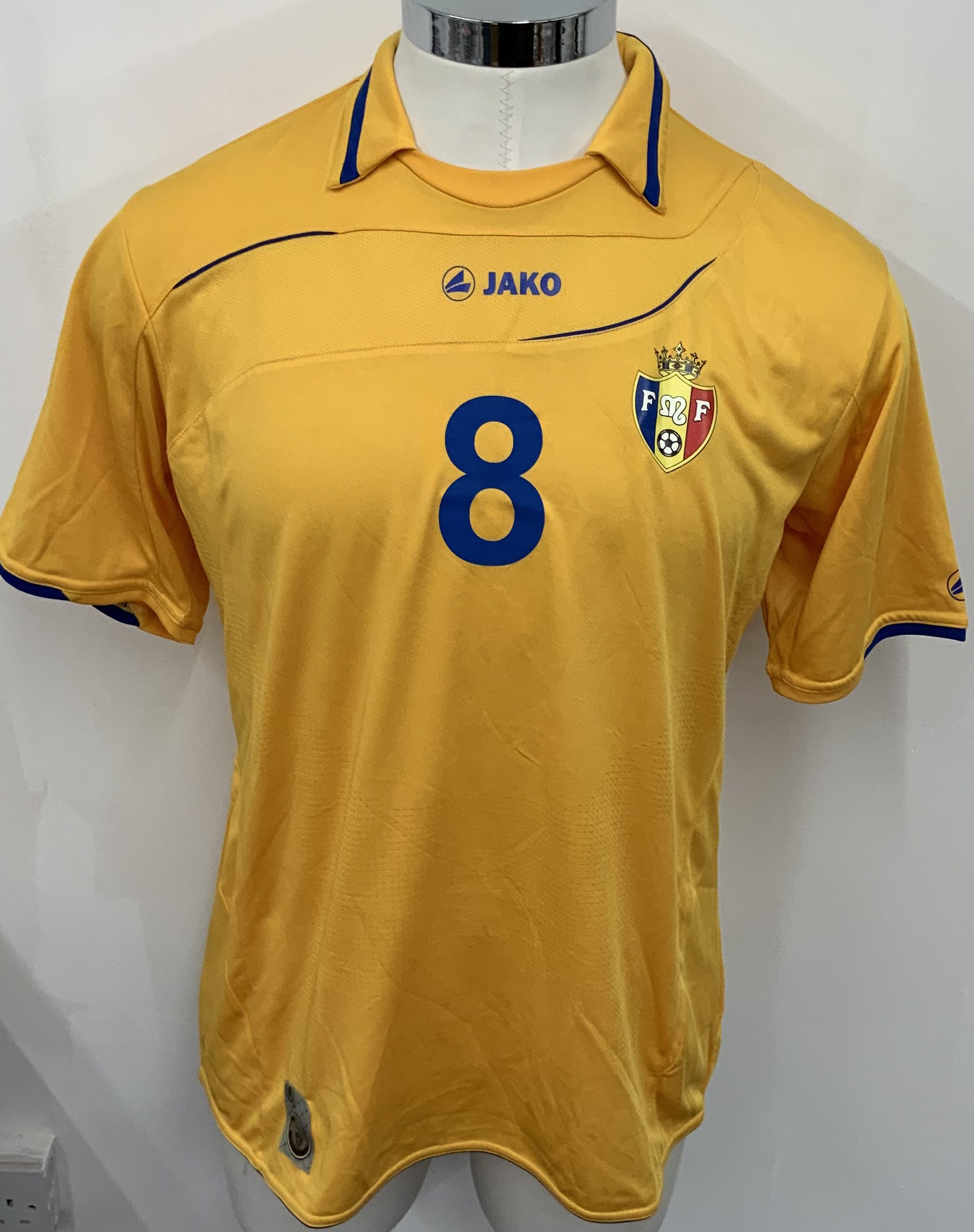 Moldova 2012 Match Worn Football Shirt: Yellow short sleeve shirt. Number 8. Worn during friendly v El Salvador on 26 May 2012.