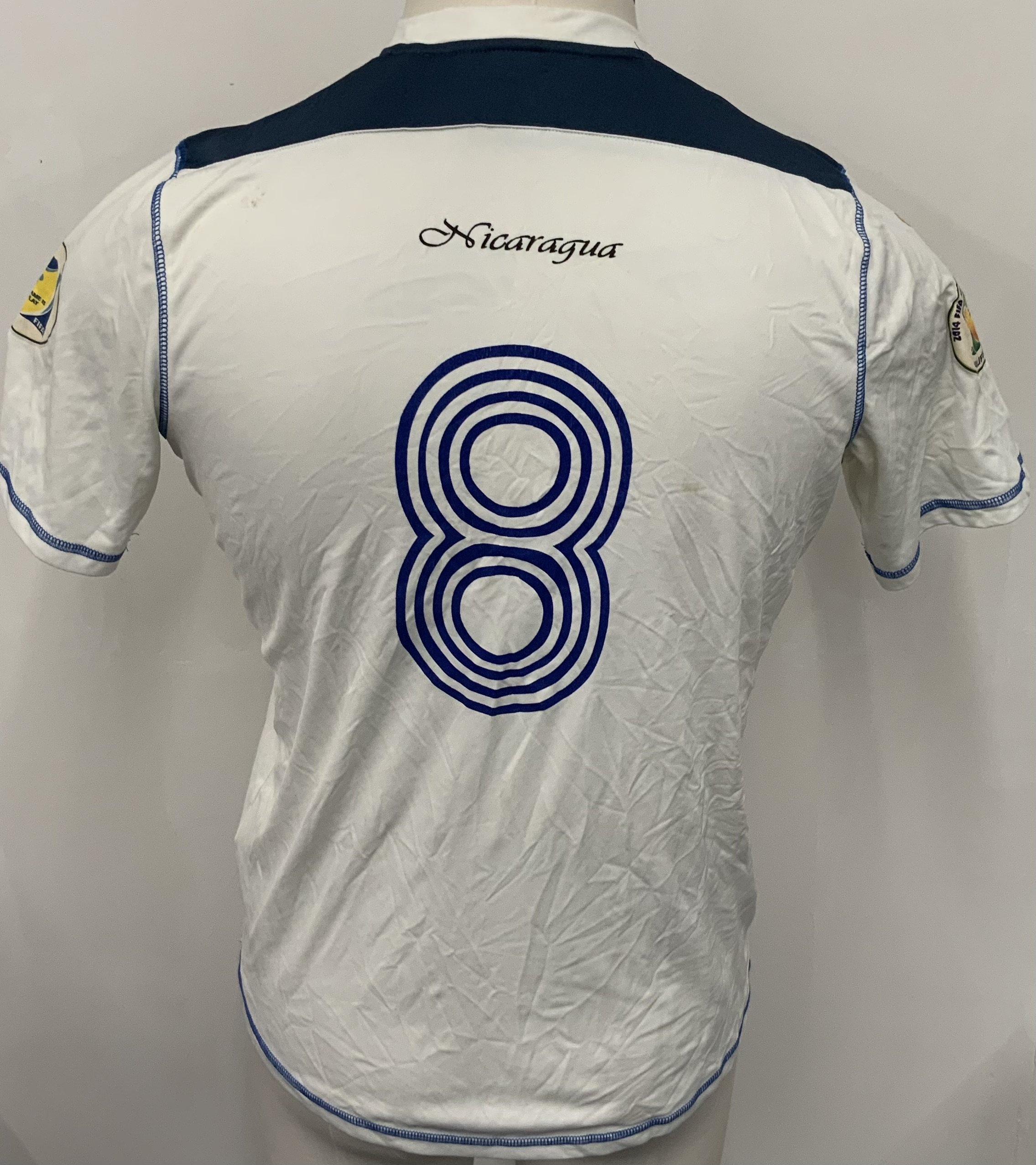 Nicaragua 2011 Match Worn Football Shirt: White short sleeve shirt. Number 8. Worn v Panama in the World Cup qualifier played on 11 October 2011. World Cup badging to sleeve. 