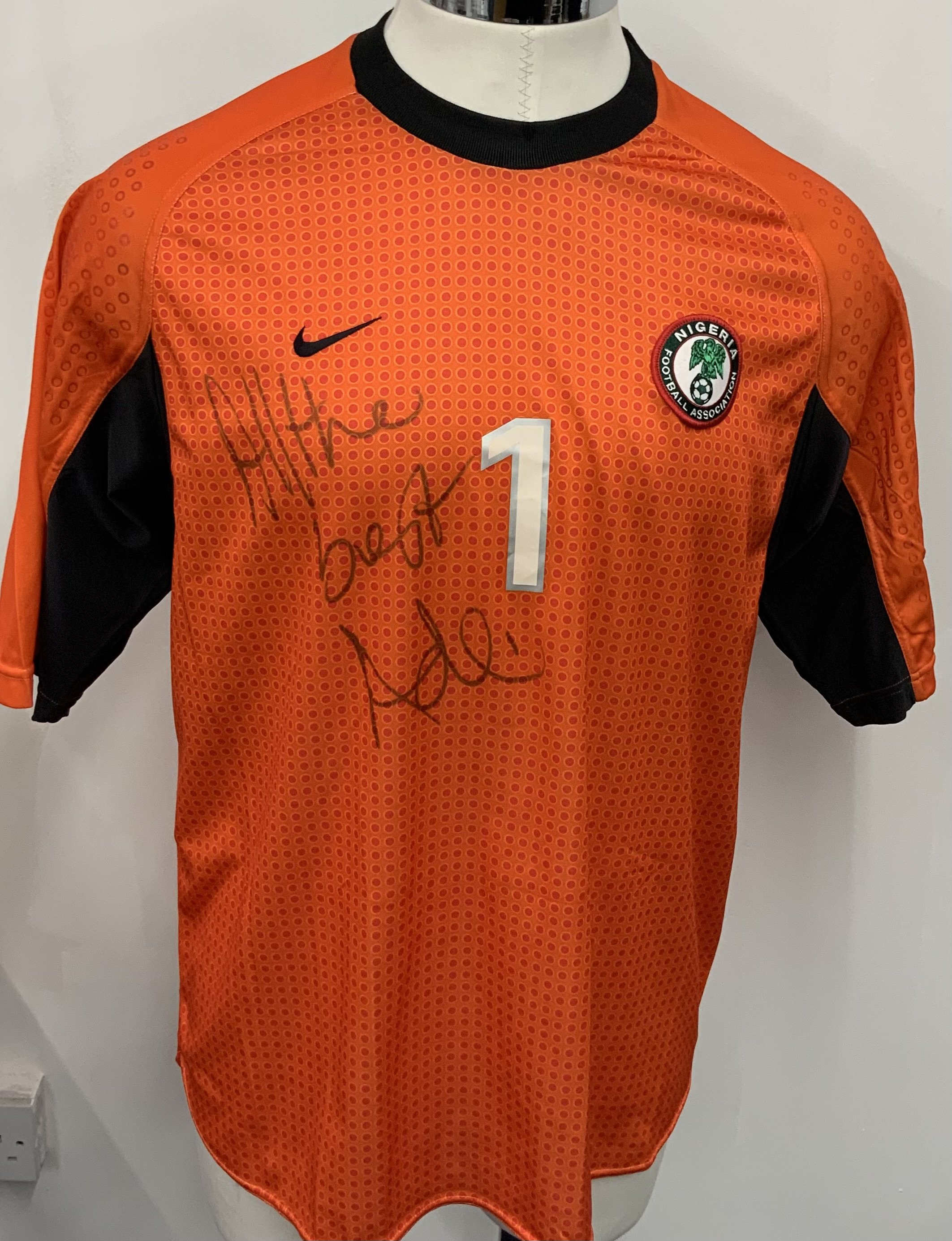 Nigeria 2006 Match Worn Football Shirt: Orange short sleeve goalkeepers shirt. Number 1. Signed by the goalkeeper Bankole.