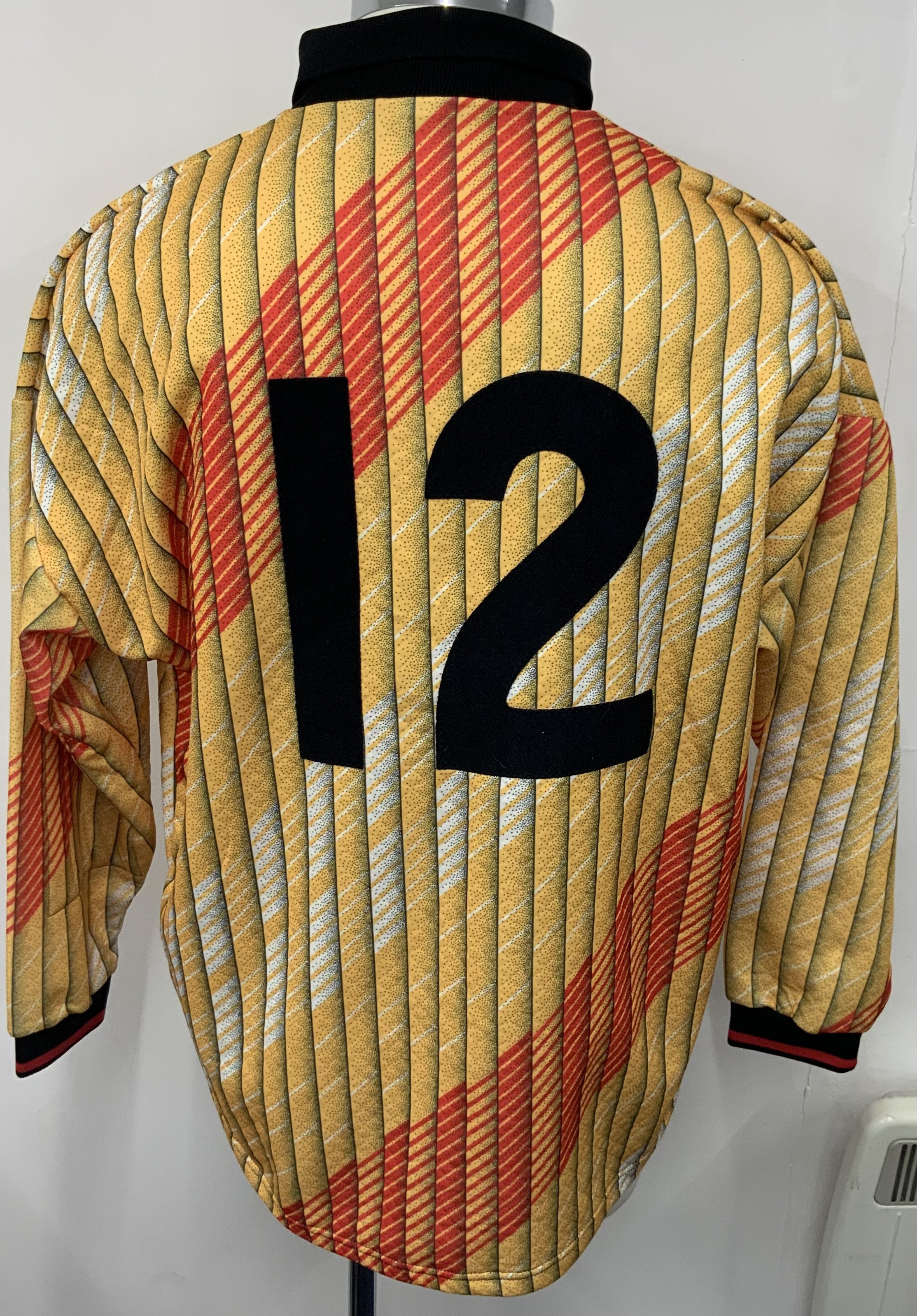 Northern Ireland 1995 Match Issued Goalkeepers Kit: Stunning padded number 12 multi coloured match issued shirt and shorts. Issued to Trevor Wood. COA from gamewornfootballshirts. 