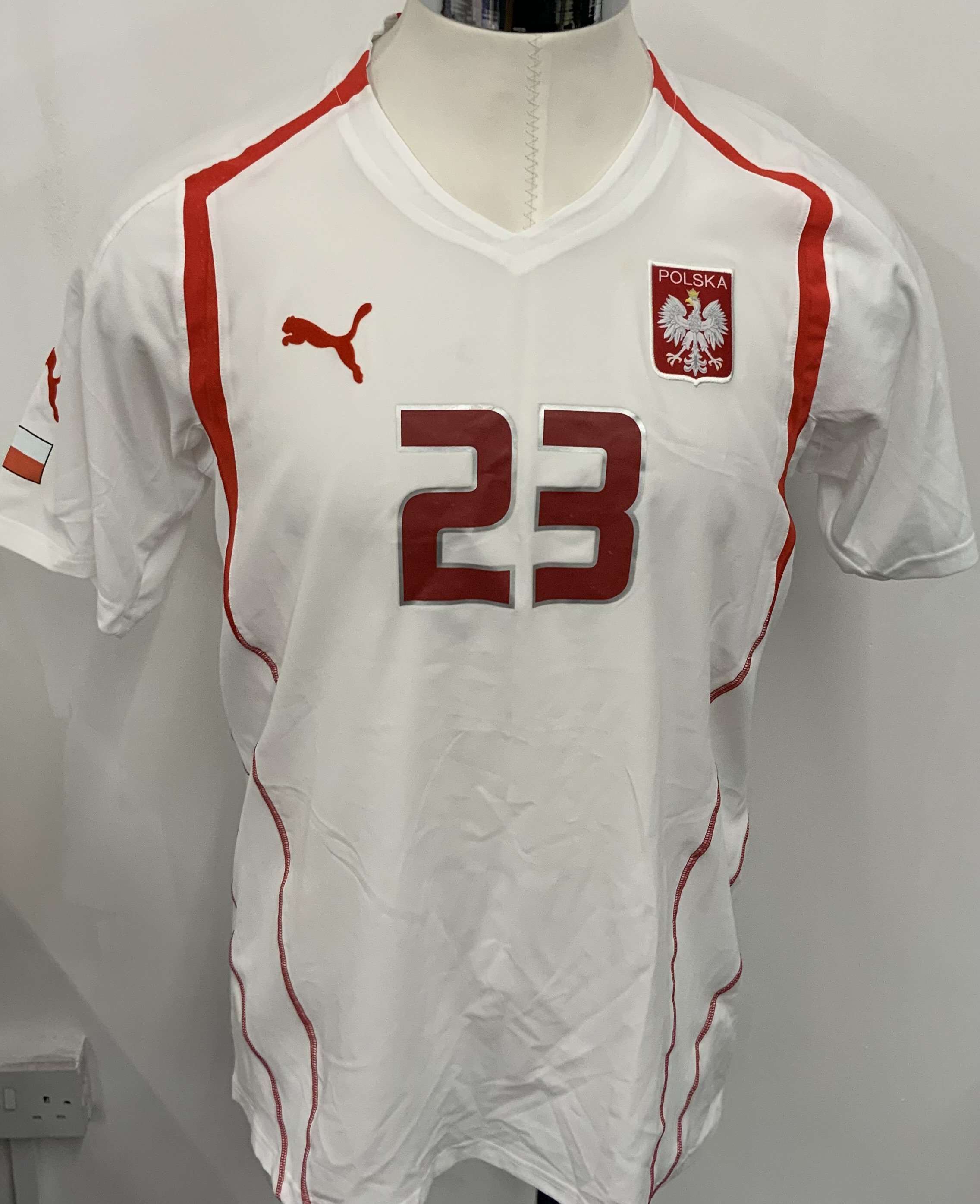 Poland 2006 Match Worn Football Shirt: White short sleeve shirt. Number 22. We believe this shirt used to have a patch to sleeve and may have come off in wash. 
