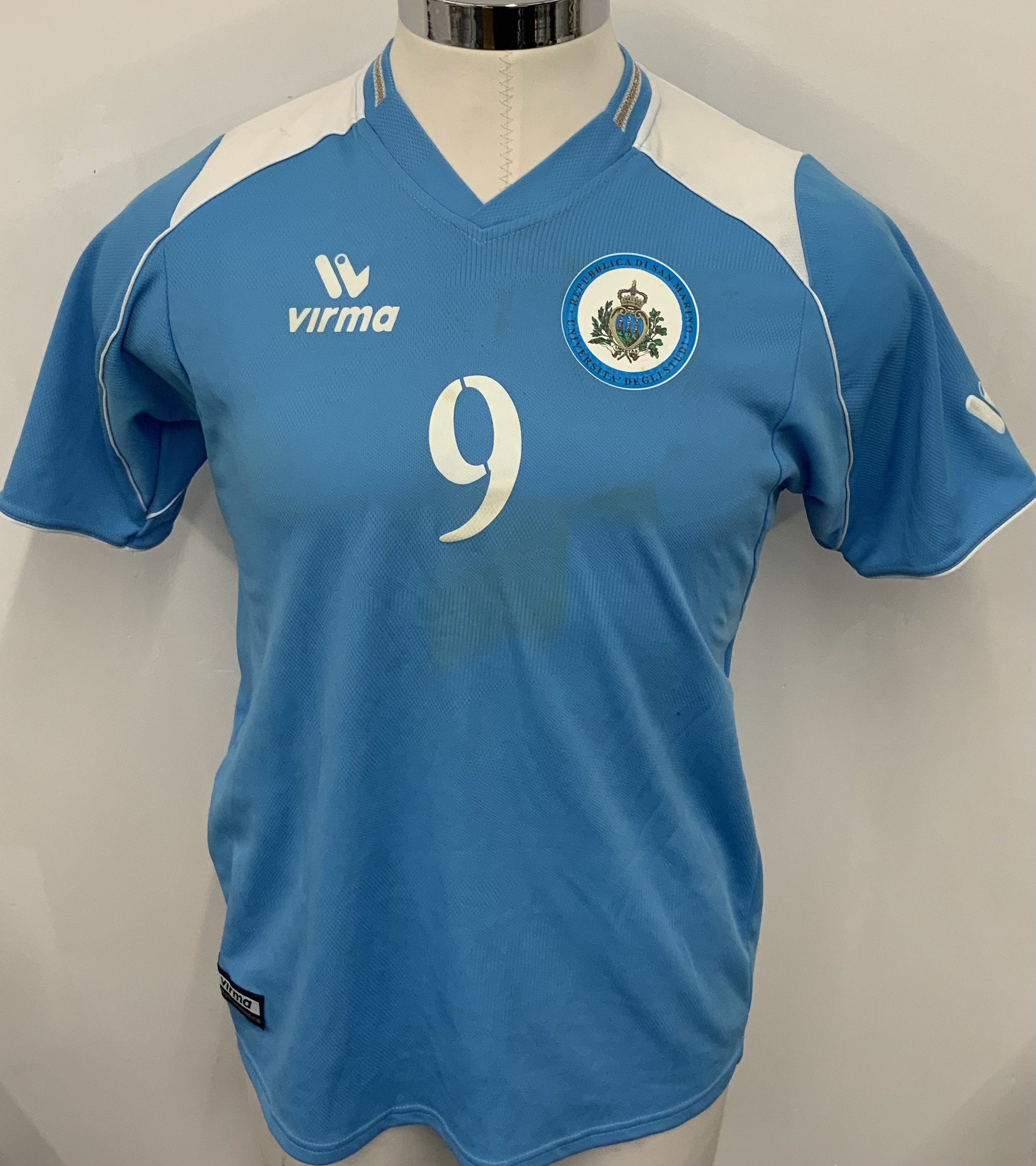 San Marino 2005 Match Worn Football Shirt: Blue short sleeve shirt. Number 9. Worn during World Cup Qualifier v Bosnia on 4 June 2005. Shirt is unwashed. 