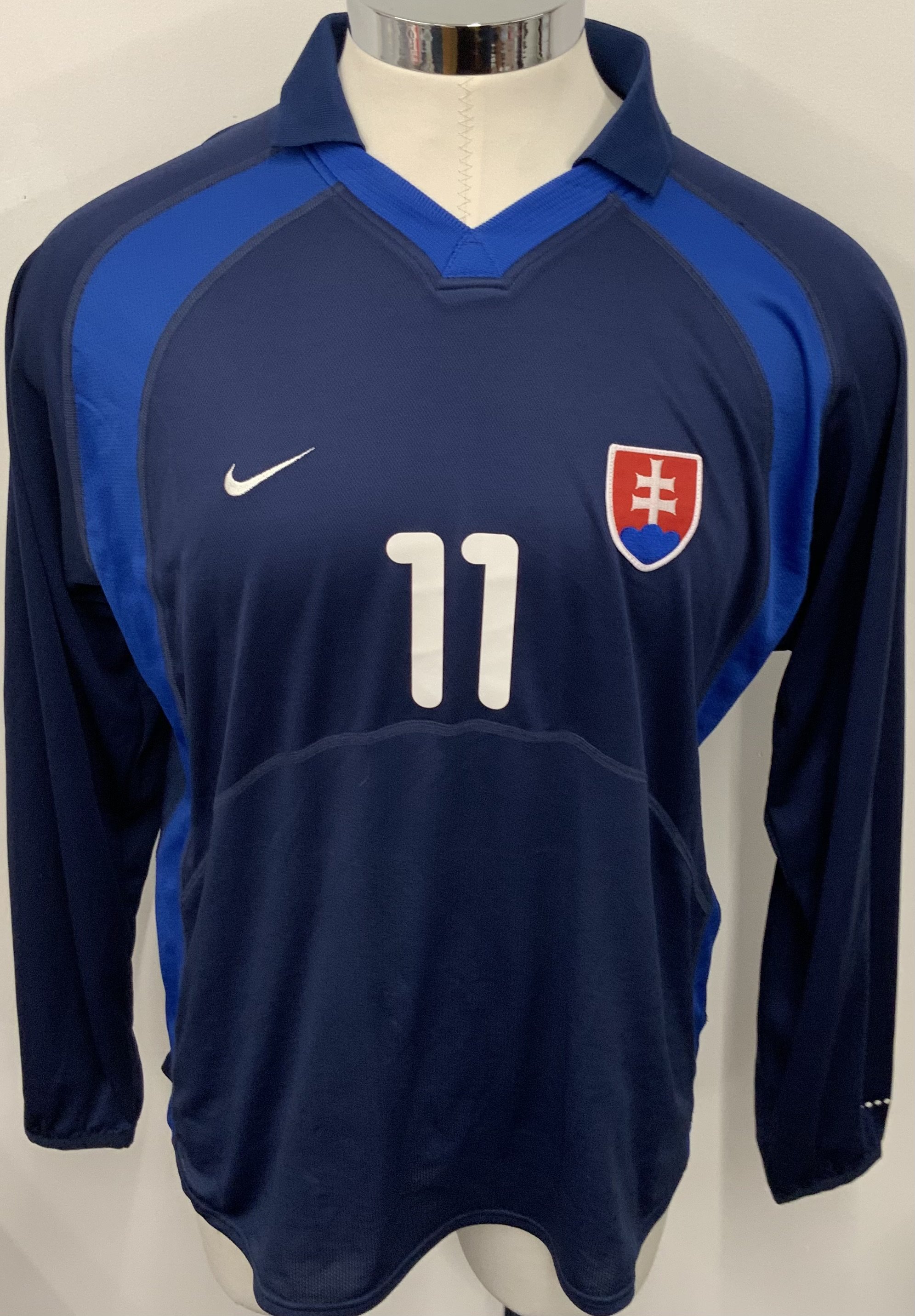 Slovakia Match Worn Football Shirt: Blue long sleeve shirt. Number 7. Worn v Germany on 29 May 2001.