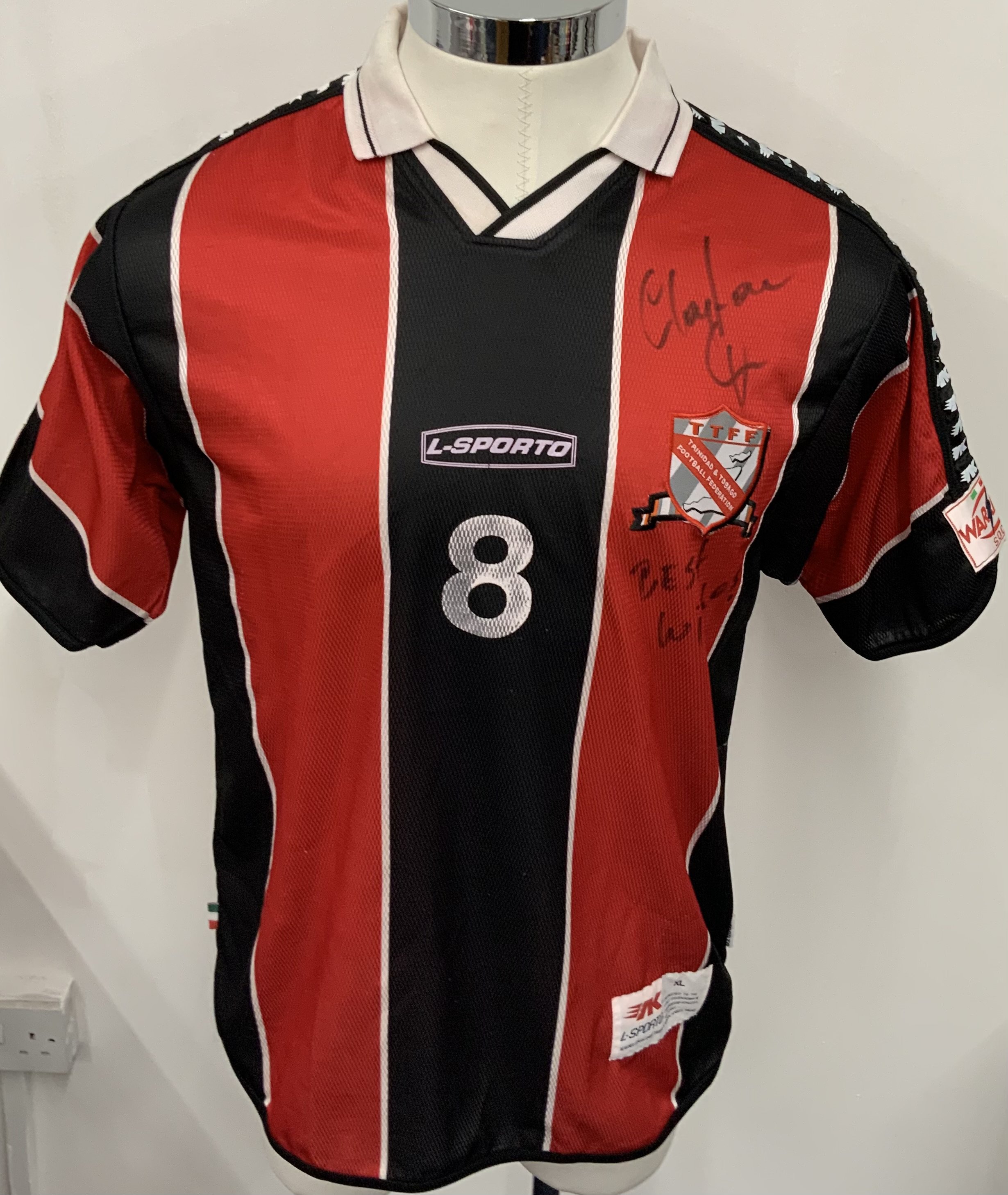 Trinidad and Tobago 2002 Match Worn Football Shirt: Red and black striped short sleeve shirt. Number 8. Signed to front by Clayton Ince and with other signatures to rear.