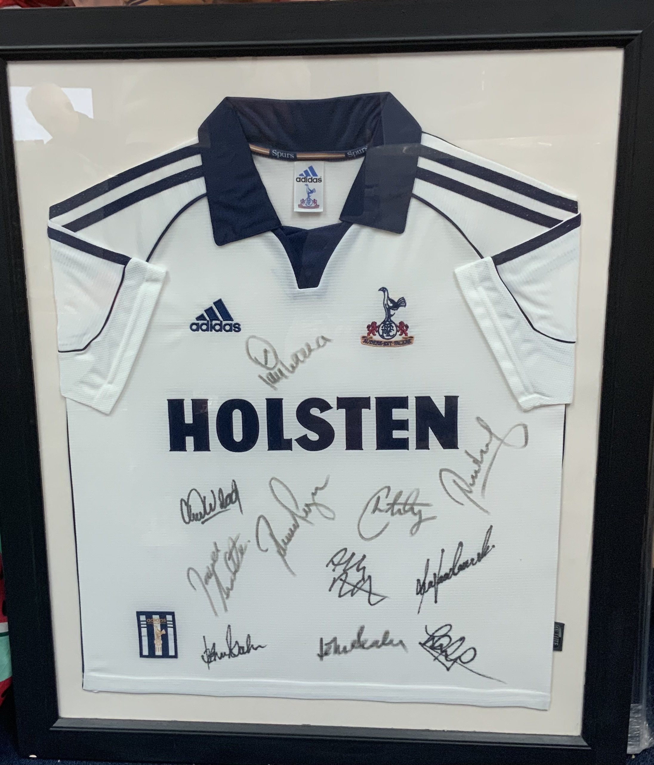 Tottenham 2000 - 2001 Framed Signed Football Shirt: Squad signed original Adidas Holsten shirt by 11 including Ferdinand. Frame measures approximately 32 inches by 27 inches. No COA. Not for posting. 