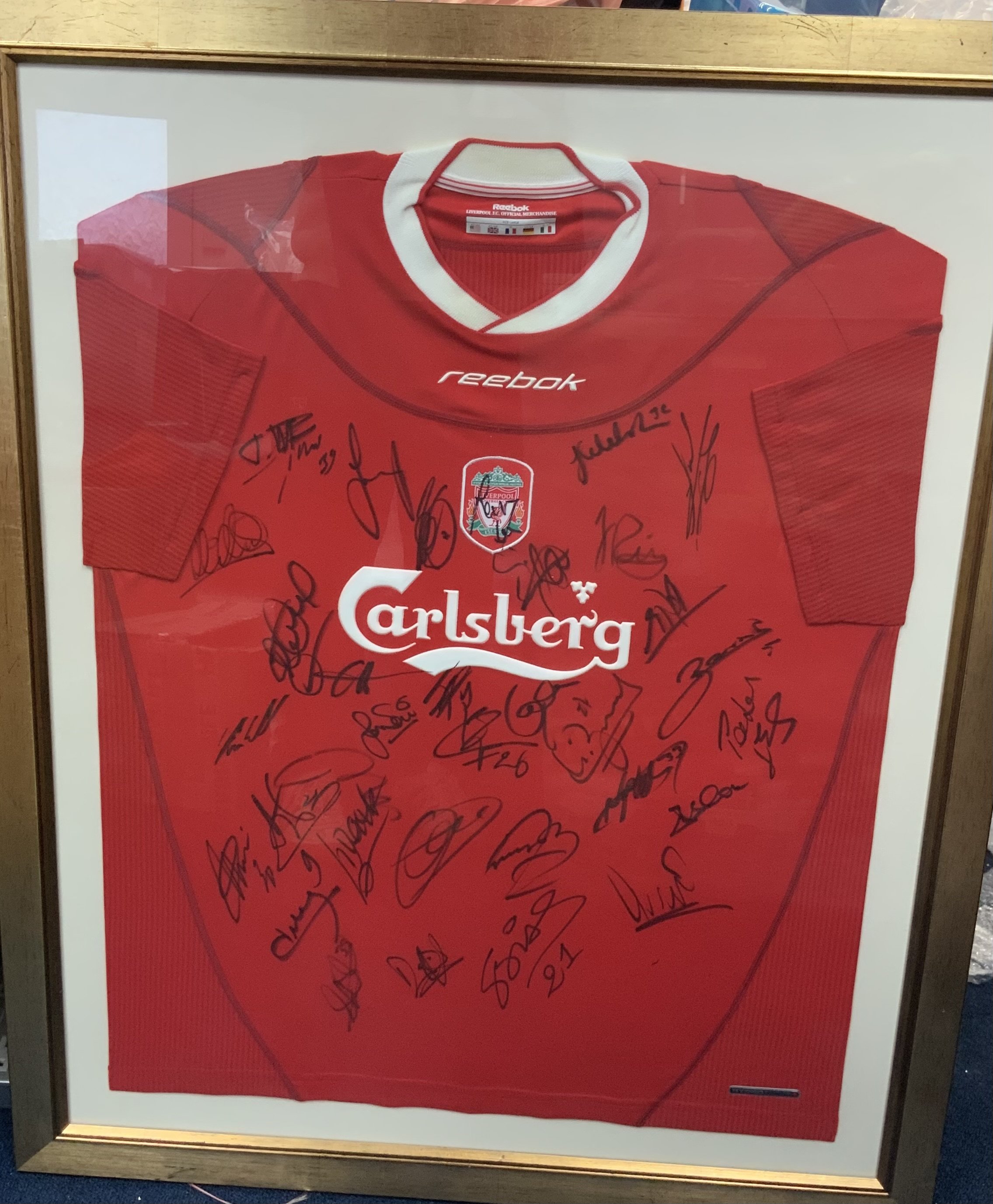 Liverpool 2002 - 2003 Signed Squad Framed Football Shirt: Home short sleeve size 42/44 multi signed shirt. Frame measures approximately 38 inches by 31 inches. No COA. Not for posting. 
