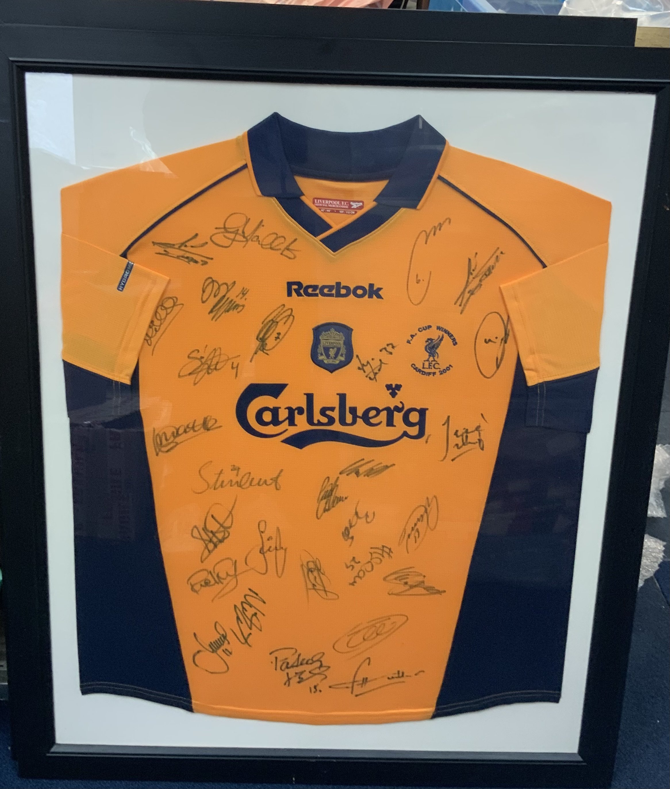 Liverpool 2001 FA Cup Winners Squad Signed Framed Football Shirt: Comes with COA and signature map. Frame measures approximately 38 x 31 inches. Shirt is embossed with FA Cup winners Cardiff 2001. Not for posting. 
