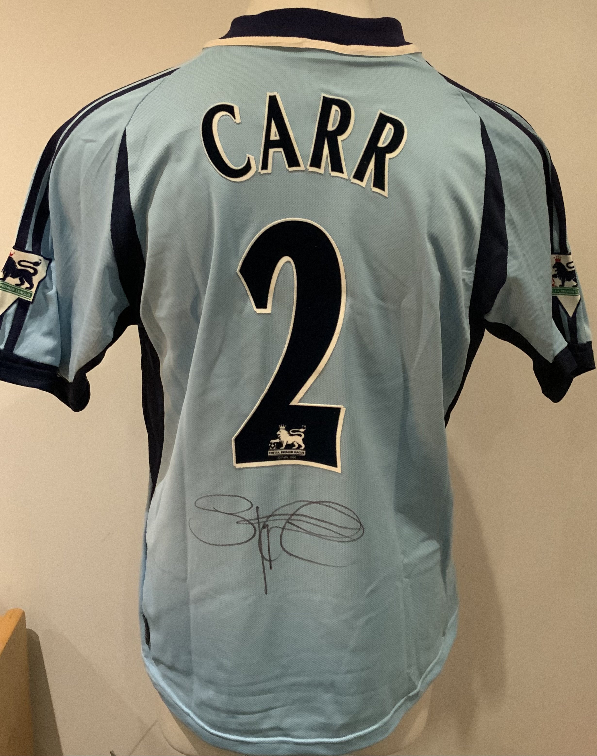 Tottenham 2001 - 2002 Match Worn Football Shirt: Blue away short sleeve shirt with Premier League badging to sleeves Number 2 Carr to rear. Shirt is signed to rear by the player. 