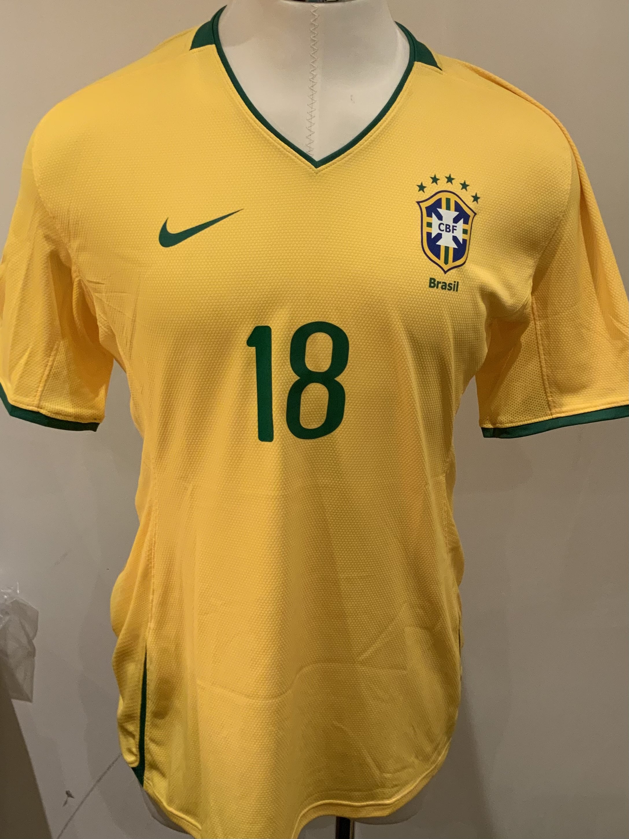Brazil Match Issued Football Shirt: Yellow short sleeve shirt with number 18 to rear. Issued to Adriano (Adriano Leito Ribeiro) for the 2010 World Cup qualifying tournament. 