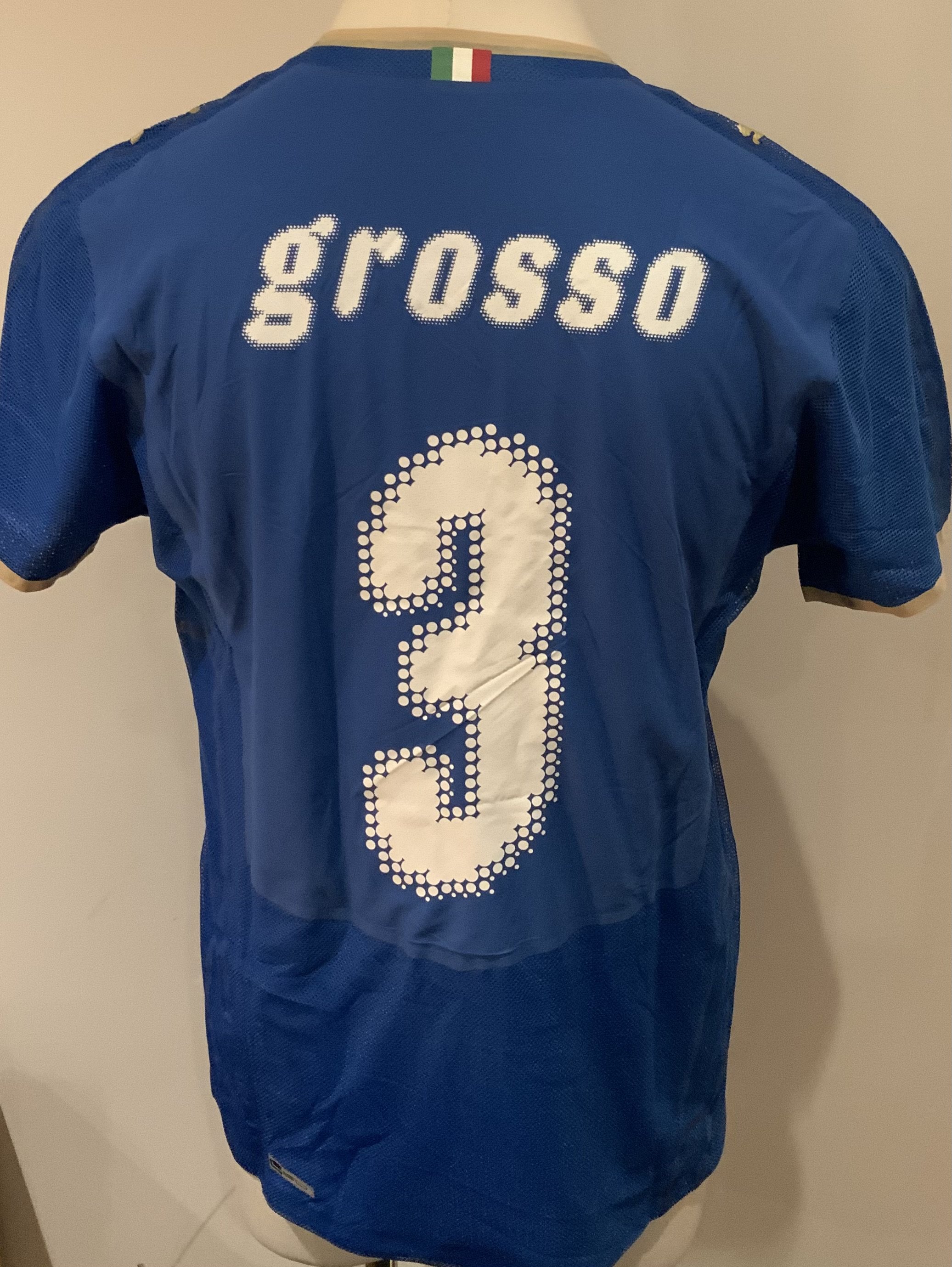 Italy Match Worn Football Shirt: Blue short sleeve shirt with Grosso 3 to rear. Shirt features FIFA World Champions badge. Worn v Northern Ireland on 6 June 2009. 