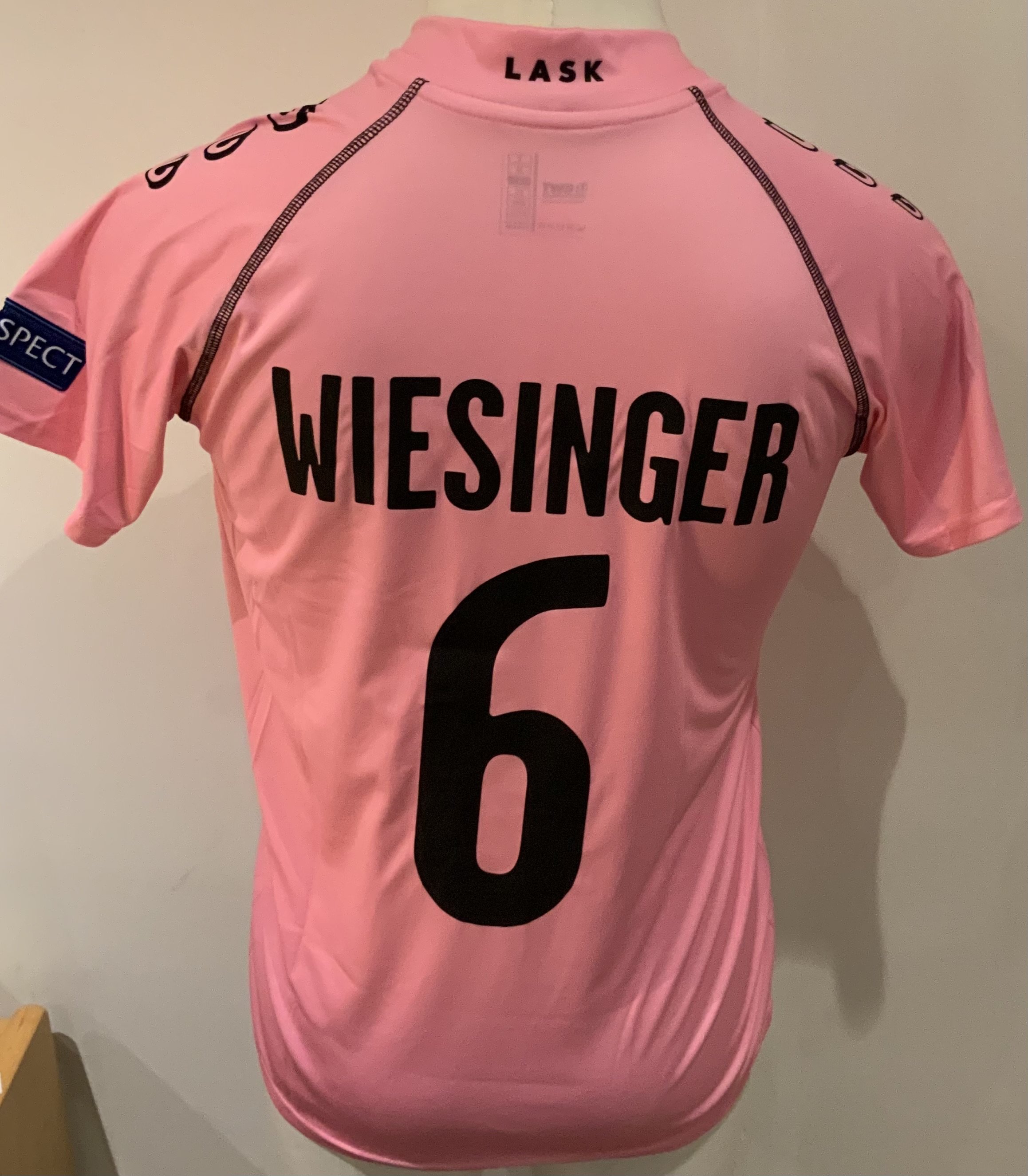 Grasshopper Zurich 2020 - 2021 Match Worn Football Shirt: Pink short sleeve shirt with Europa badging to sleeves. Weisinger 6 to rear. Worn v Tottenham on 3 December 2020 in the 3-3 draw.