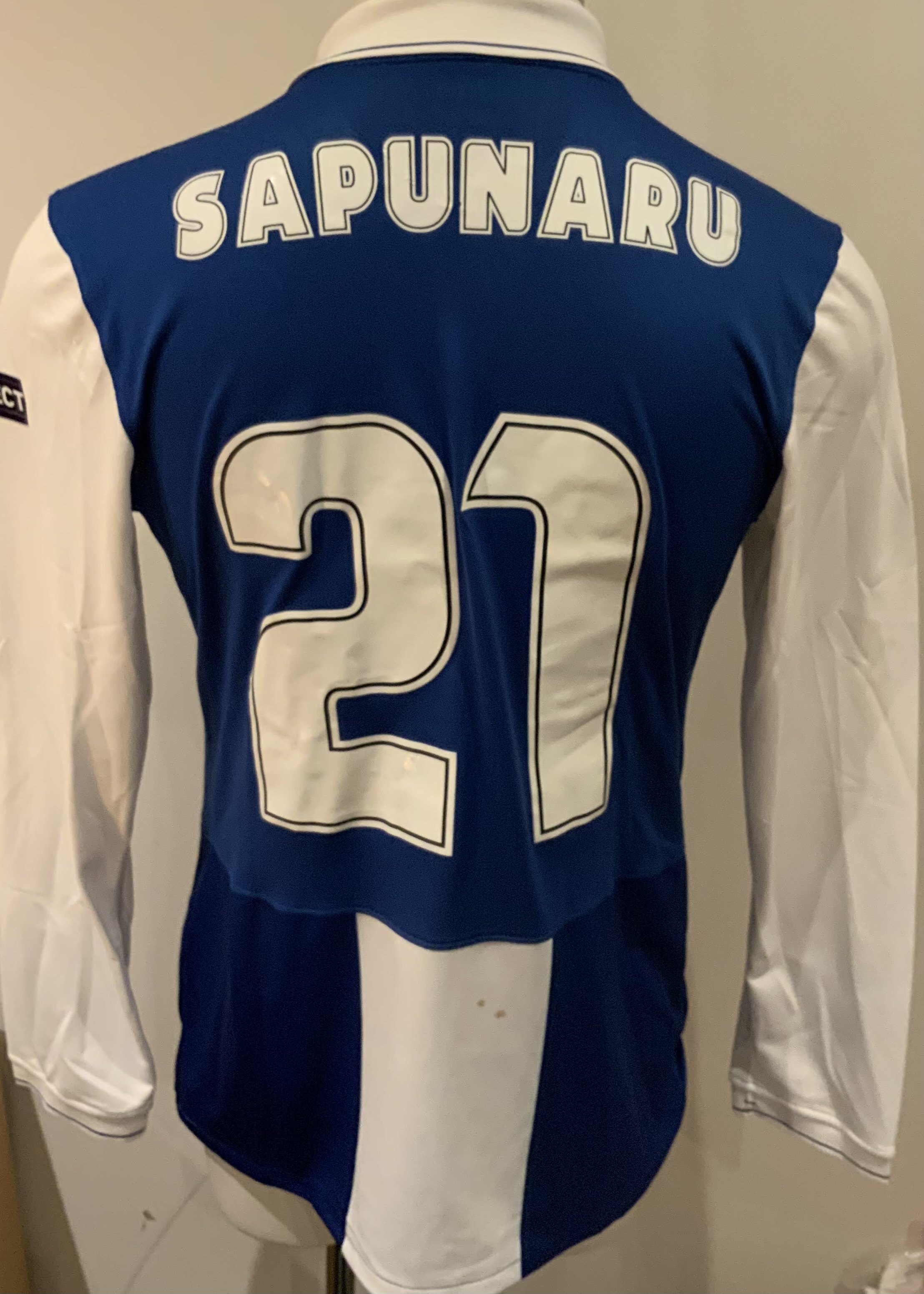 Porto 2009 - 2010 Match Worn Football Shirt: Blue and white long sleeve shirt with Champions League badging to sleeves. Sapunaru 21 to rear. Worn during the champions league campaign. 