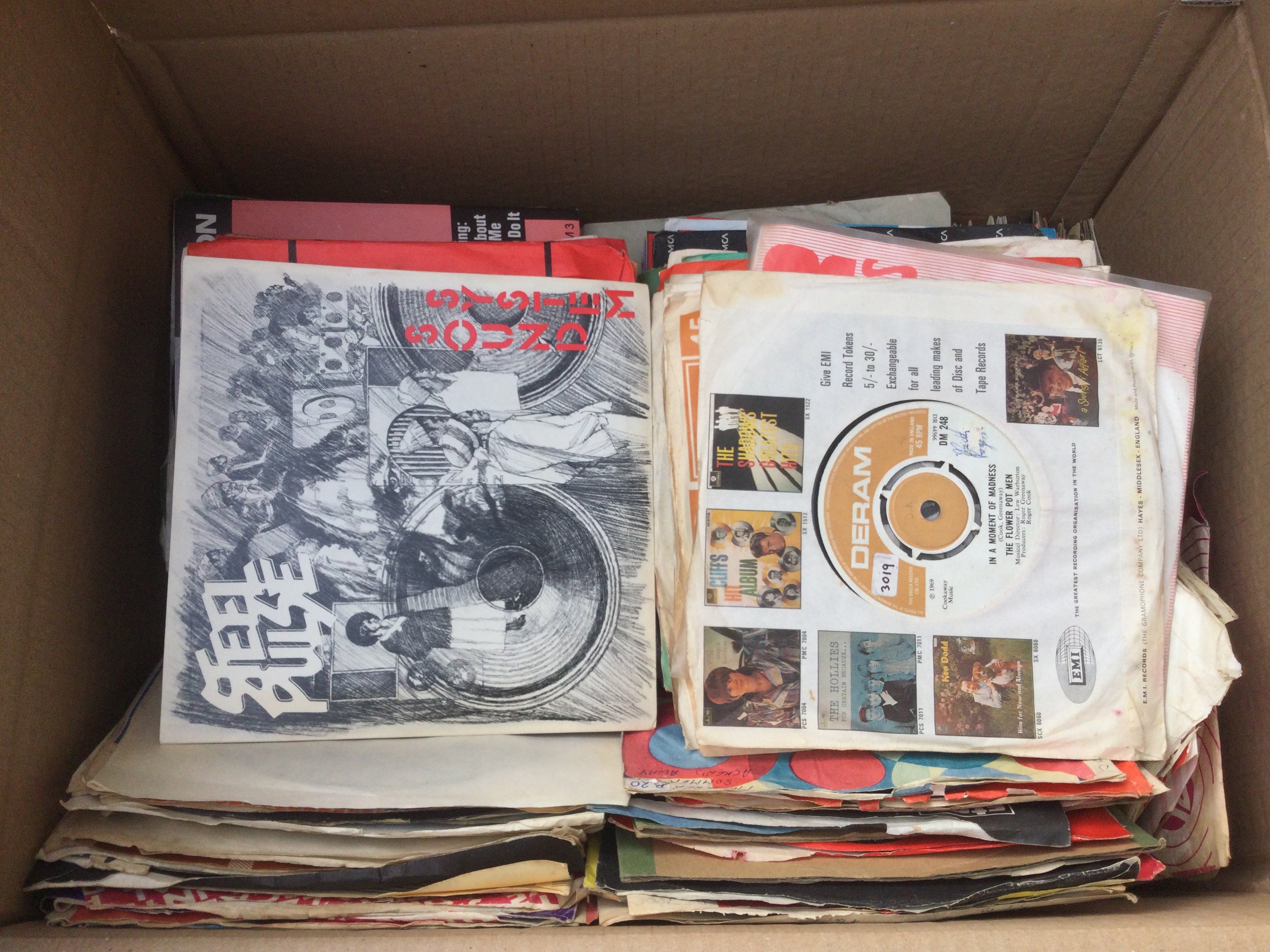 Two boxes of 7" singles and EPs by various artists including David Bowie, Kraftwerk, Steel Pulse and many more.