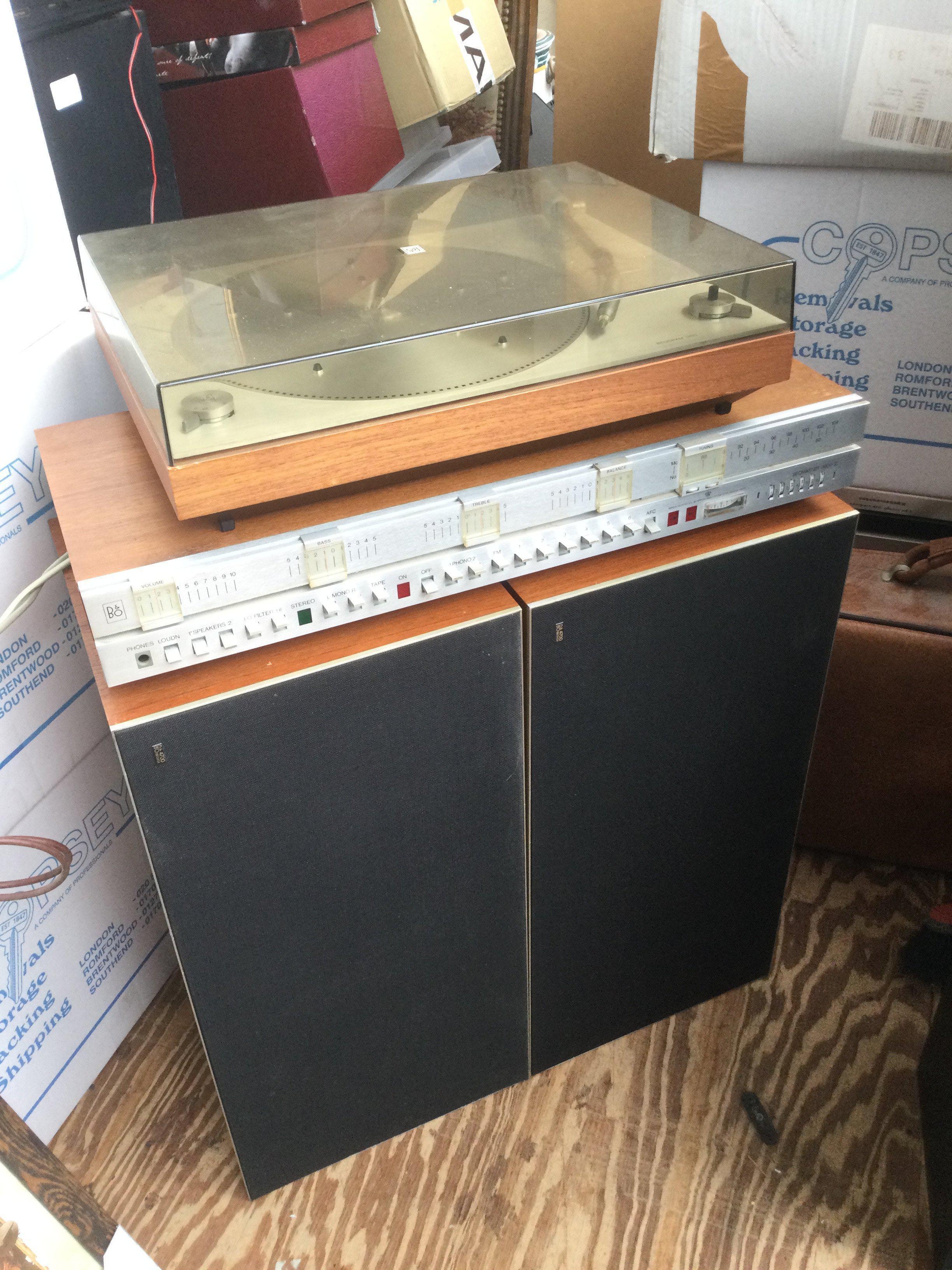 A Bang & Olufsen Beogram 1200 turntable, Beomaster 3000-2 amp and a pair of Beovox 4700 speakers (4). Comes with a manual and some cables.