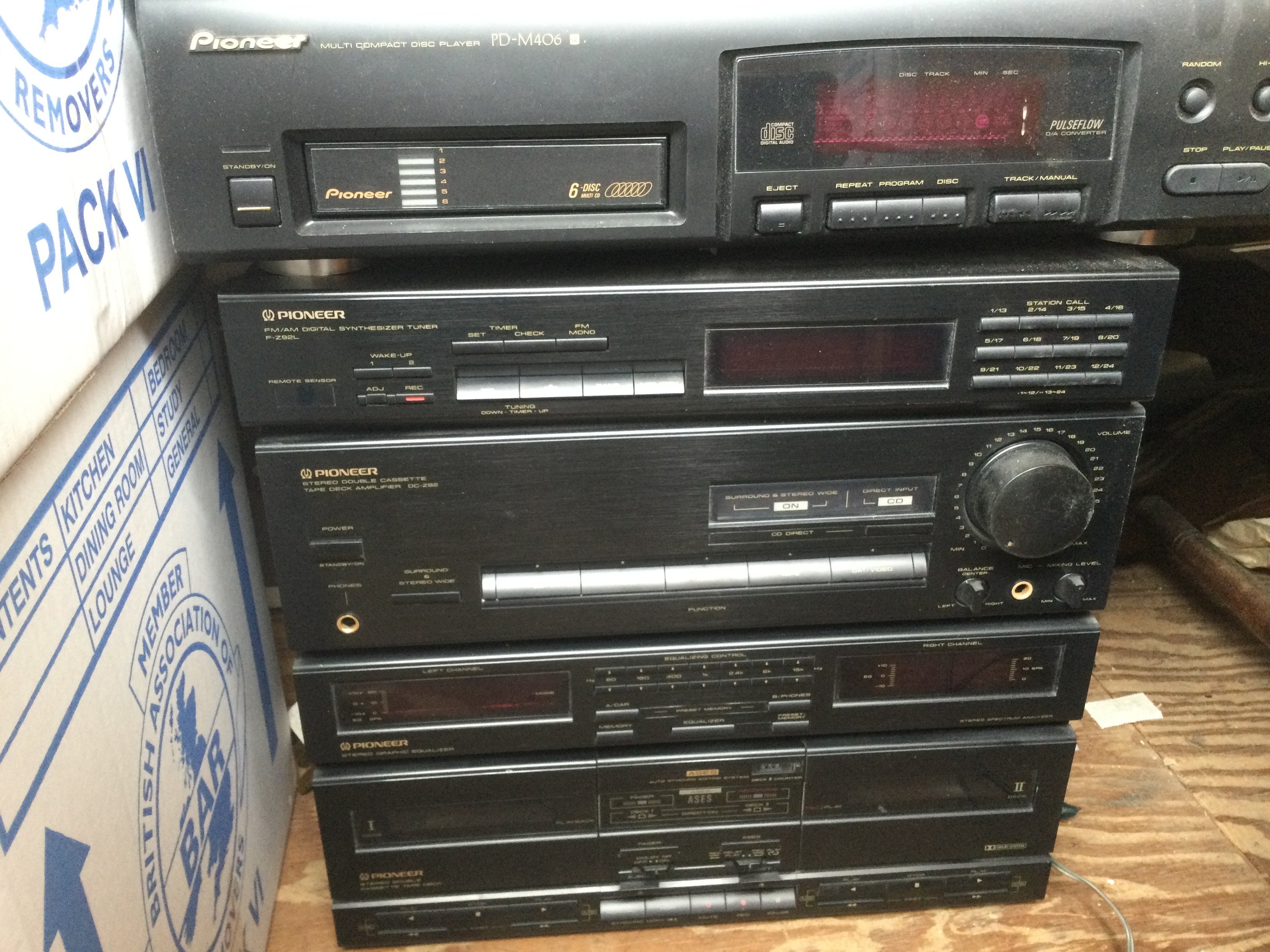 A Pioneer hifi stacking system comprising turntable, Multi CD player, amplifier etc plus a pair of speakers.