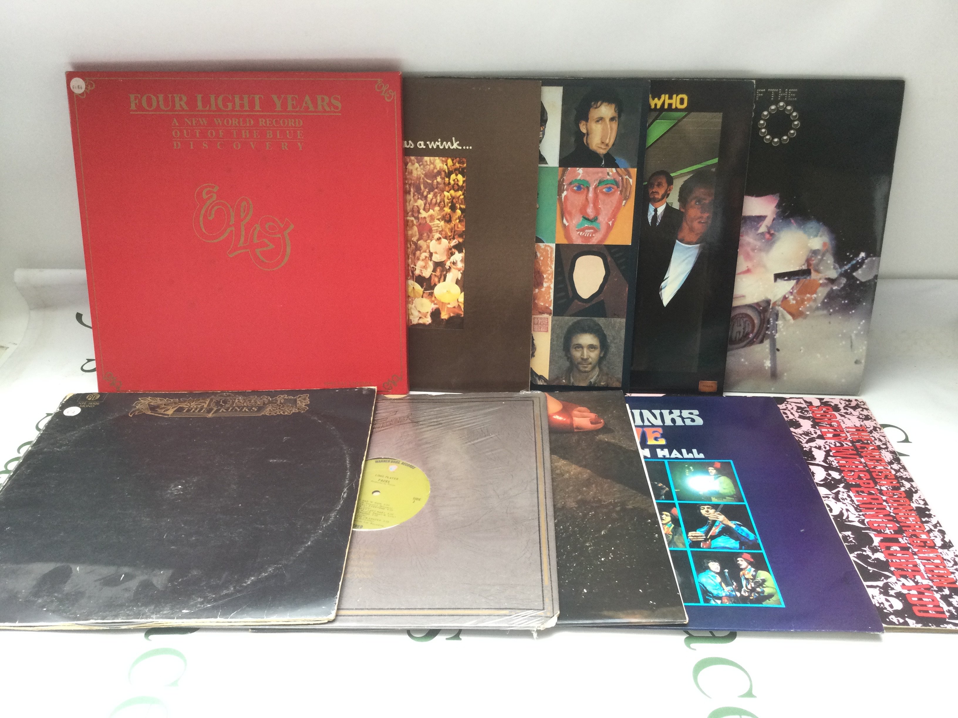 Two bags containing twenty 1970s rock and pop LPs by various artists including T Rex, Queen, Roxy Music and others.