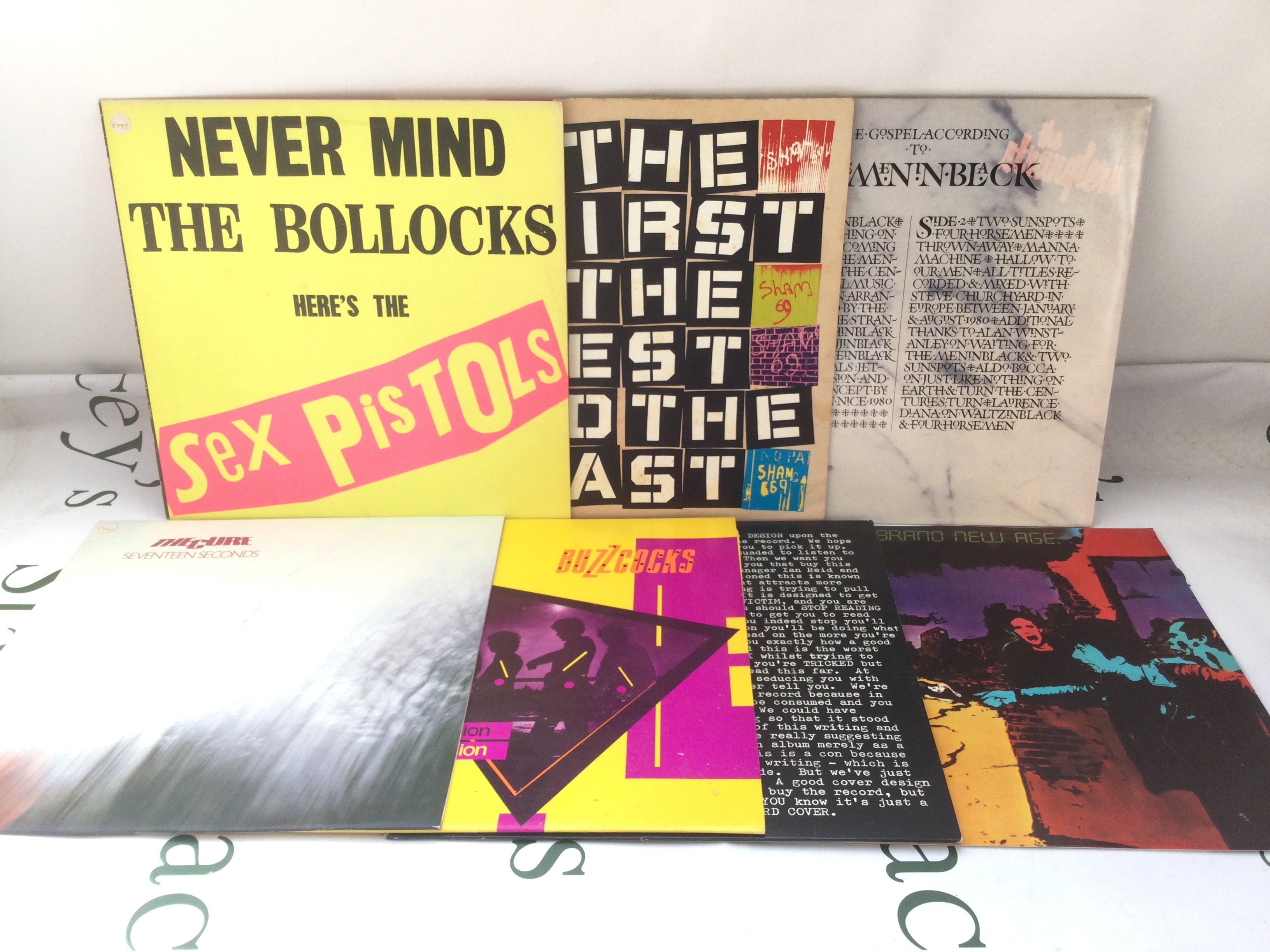 Fifteen punk and post punk LPs by various artists including Sex Pistols, UK Subs, Buzzcocks and others.
