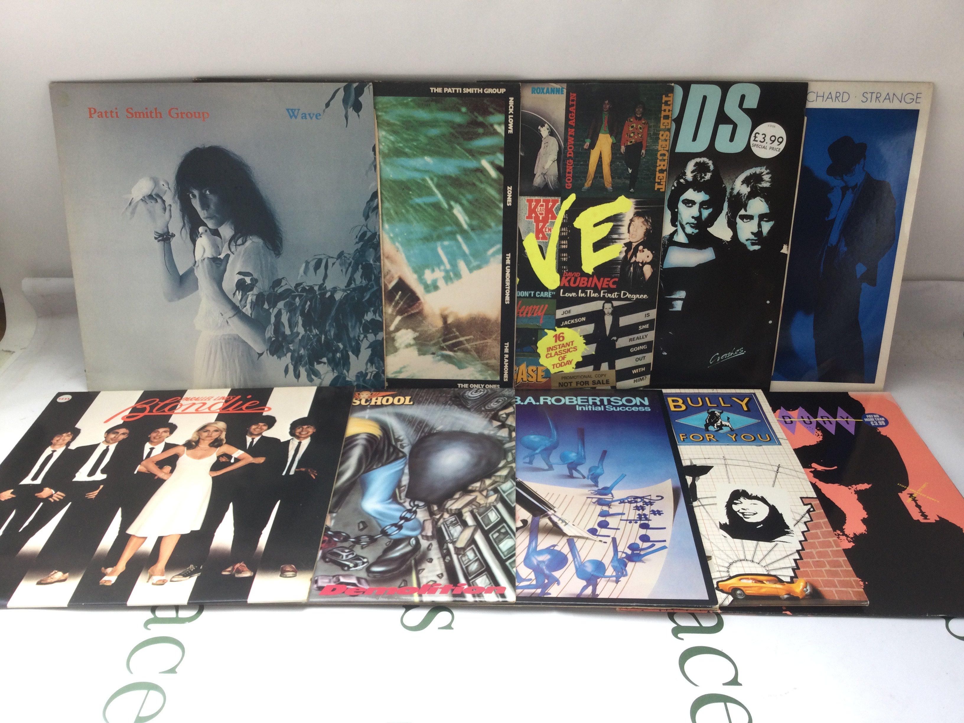 Two bags containing twenty punk and post punk LPs by various artists including Television, Patti Smith, Blondie and others including two Split Enz promo discs.