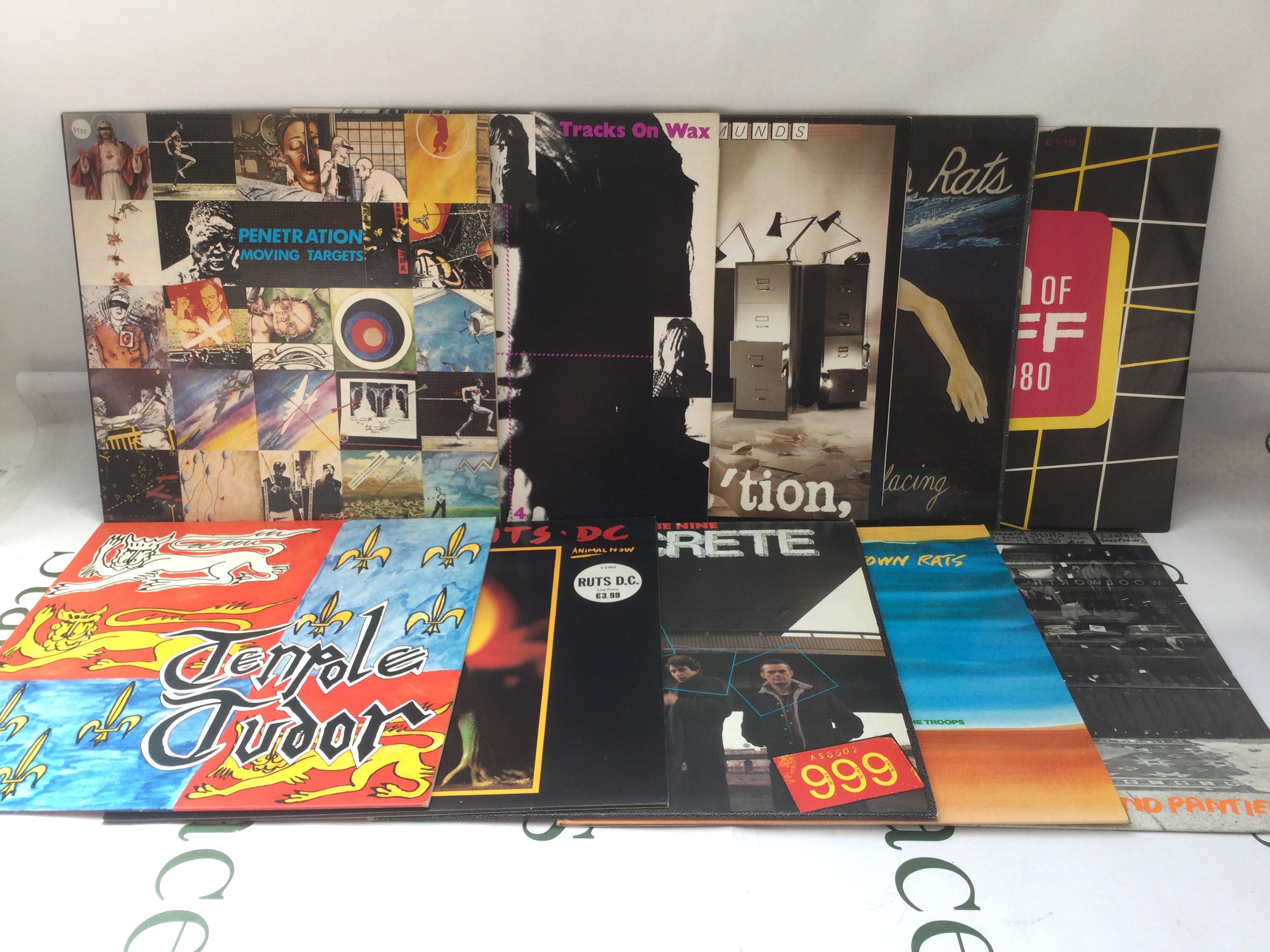 Two bags containing twenty punk and post punk LPs by various artists including The Undertones, The Skids, Tubes and others.