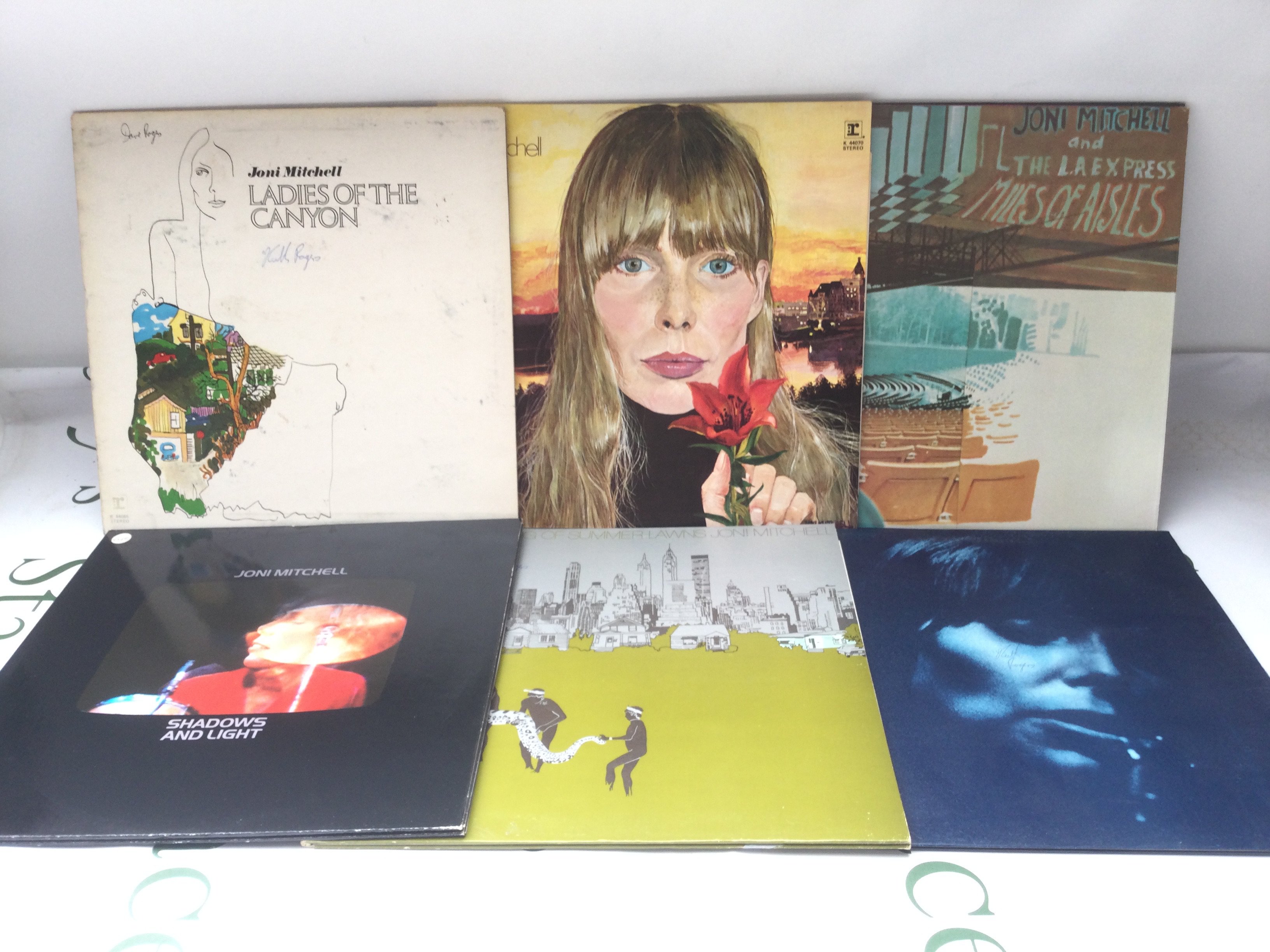 Twelve folk rock LPs by various artists including Buffalo Springfield, Stephen Stills, Joni Mitchell and others. Includes a Byrds promo disc.