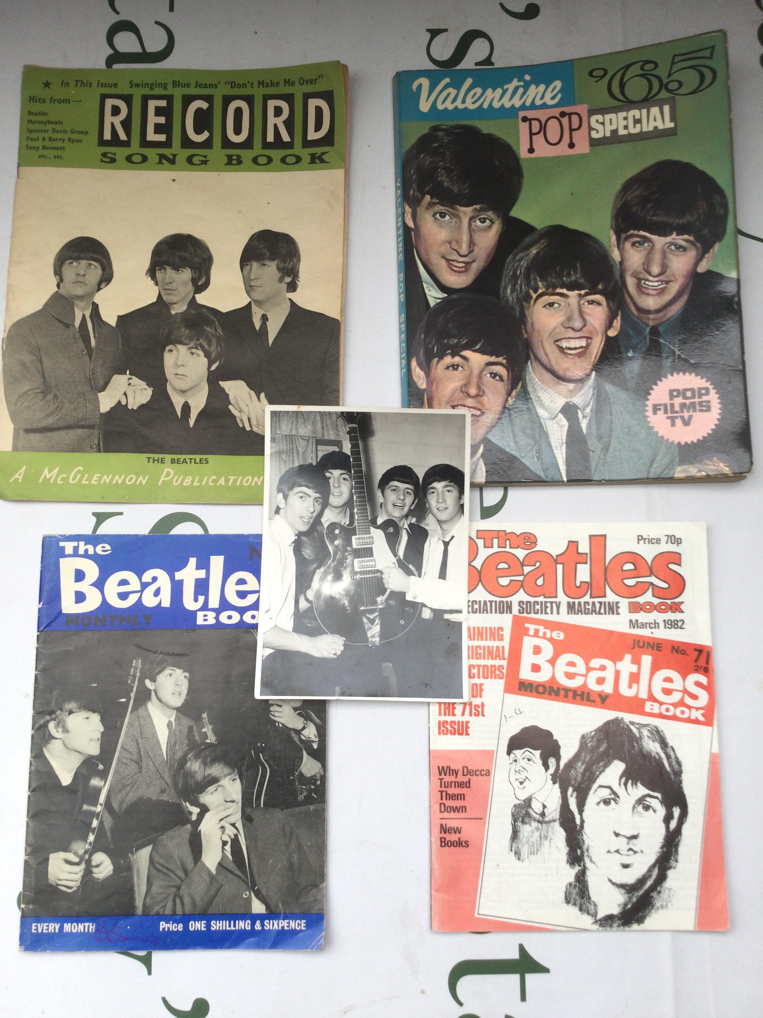 A small collection of Beatles ephemera including posters, magazines etc.