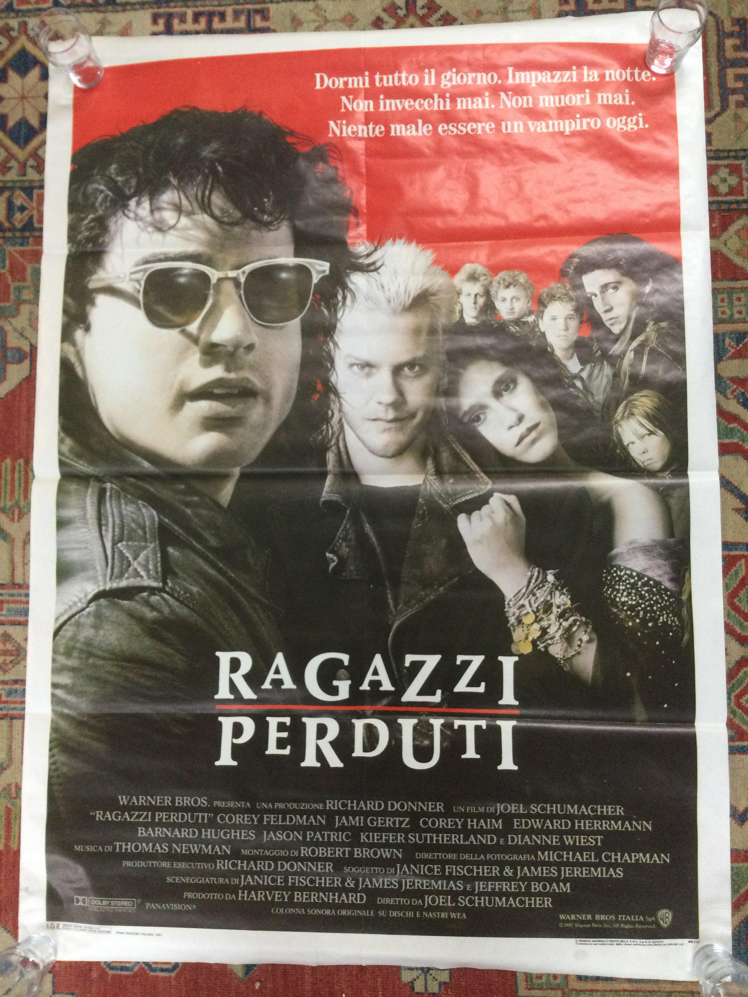 An Italian film poster for The Lost Boys, rolled. Approx 140cm x 100cm.