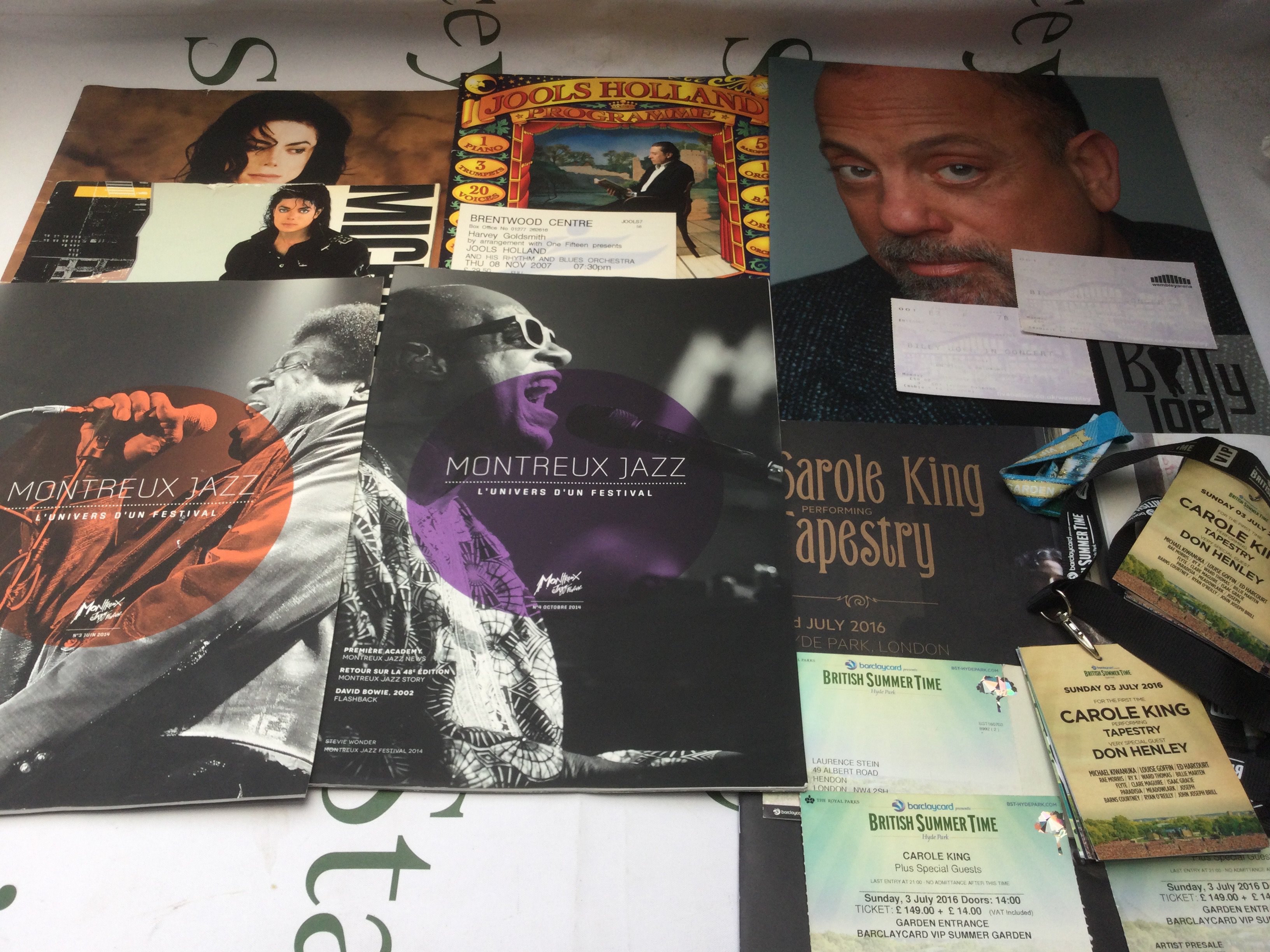 A collection of pop, soul and jazz tour programs, some with tickets. Various artists including Michael Jackson, Elton John, Whitney Houston, Carole King and many more.
