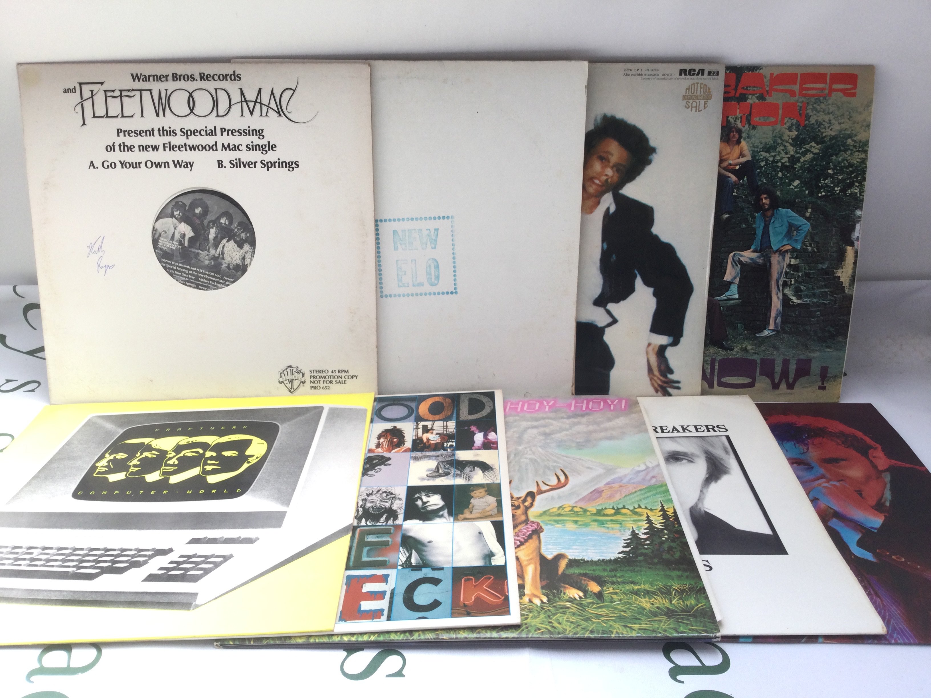 Eighteen rock and pop LPs and 12" singles by various artists including three promo discs by David Bowie, Fleetwood Mac and ELO plus others.