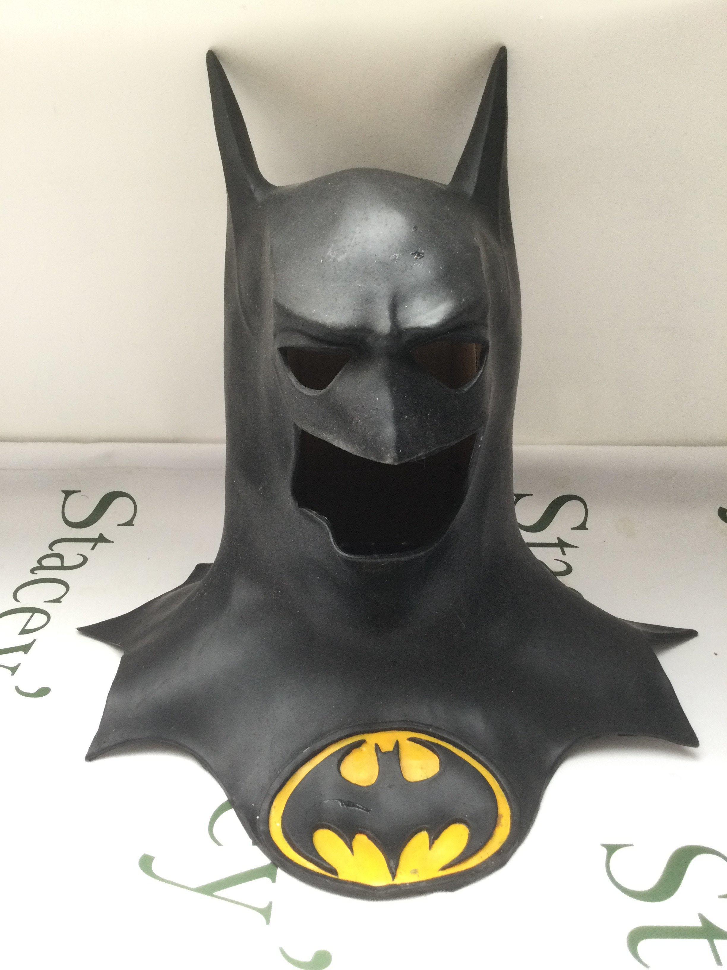 A 1992 Batman cowl by Rubies, a framed and glazed Die Another Day promotional card signed by Pierce Brosnan and Halle Berry, a custom made kimono for Memoirs of a Geisha (not screen used) and a pizza box prop from Nightmare on Elm Street signed by Lisa Wilcox.