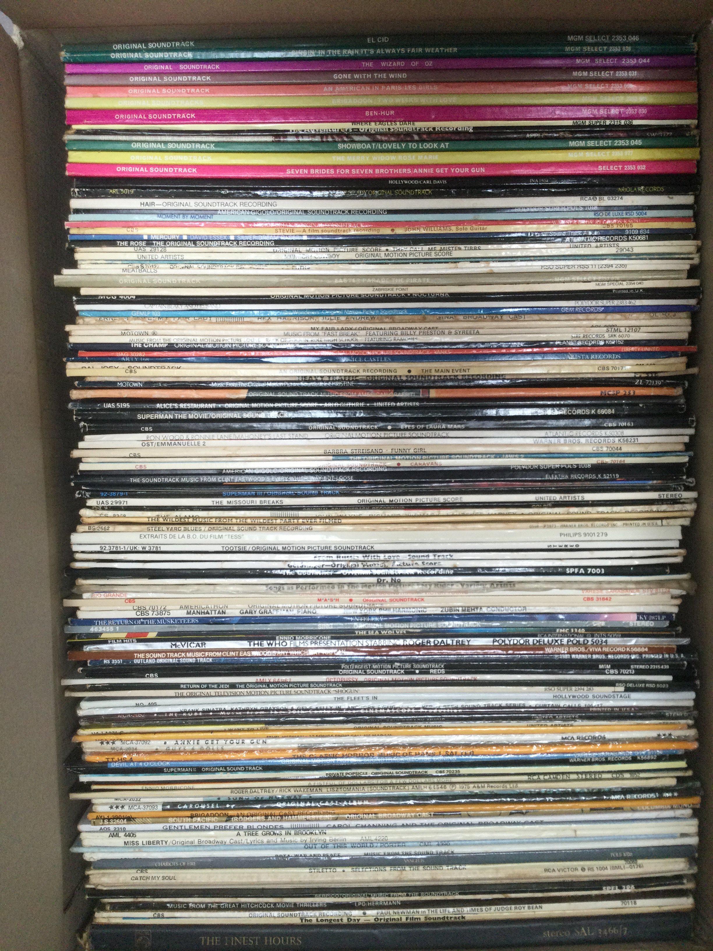 Three boxes of film, TV and theatre soundtrack LPs.