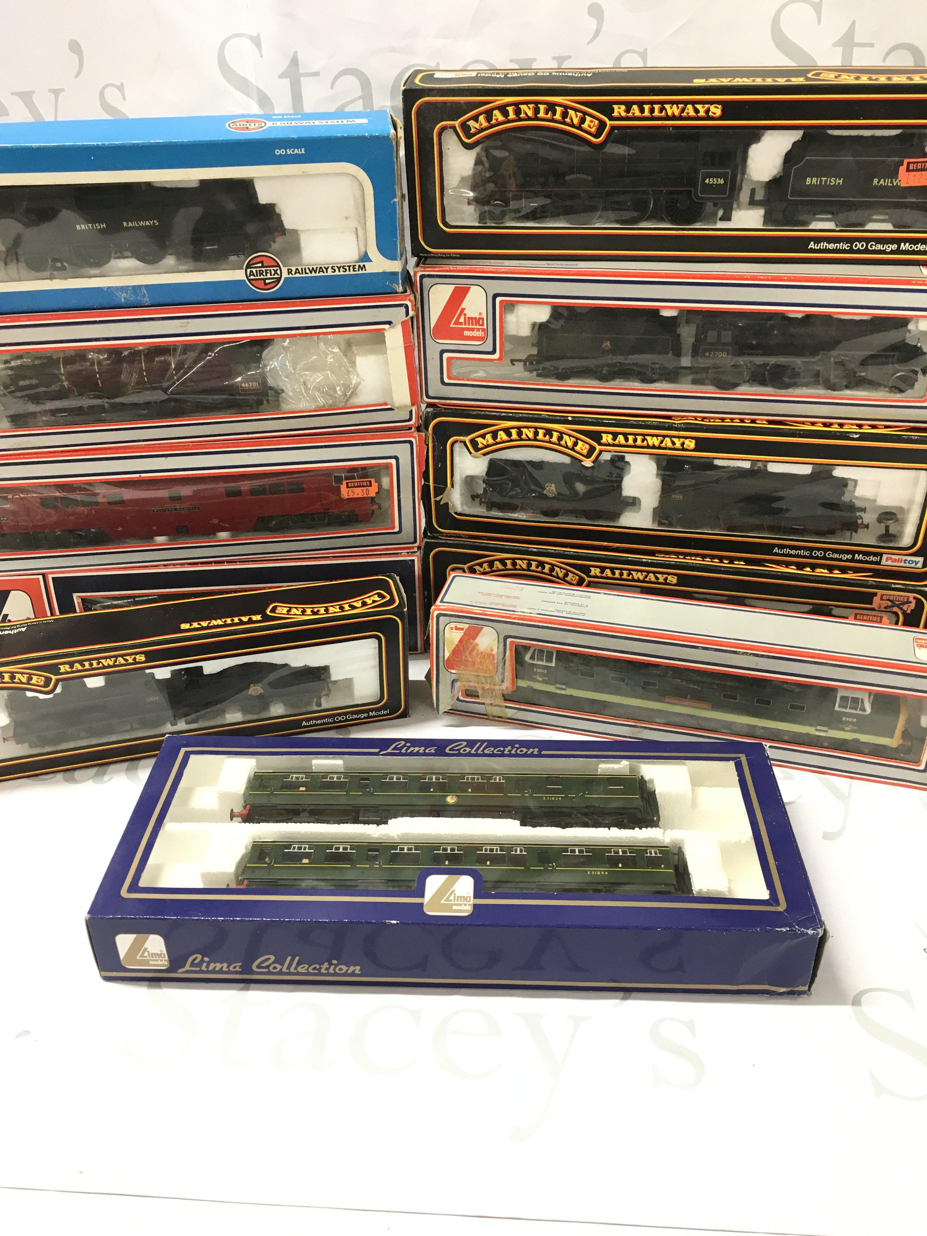 A Collection of 11 Boxed 00 Gauge Locomotives Including Lima And Mainline.