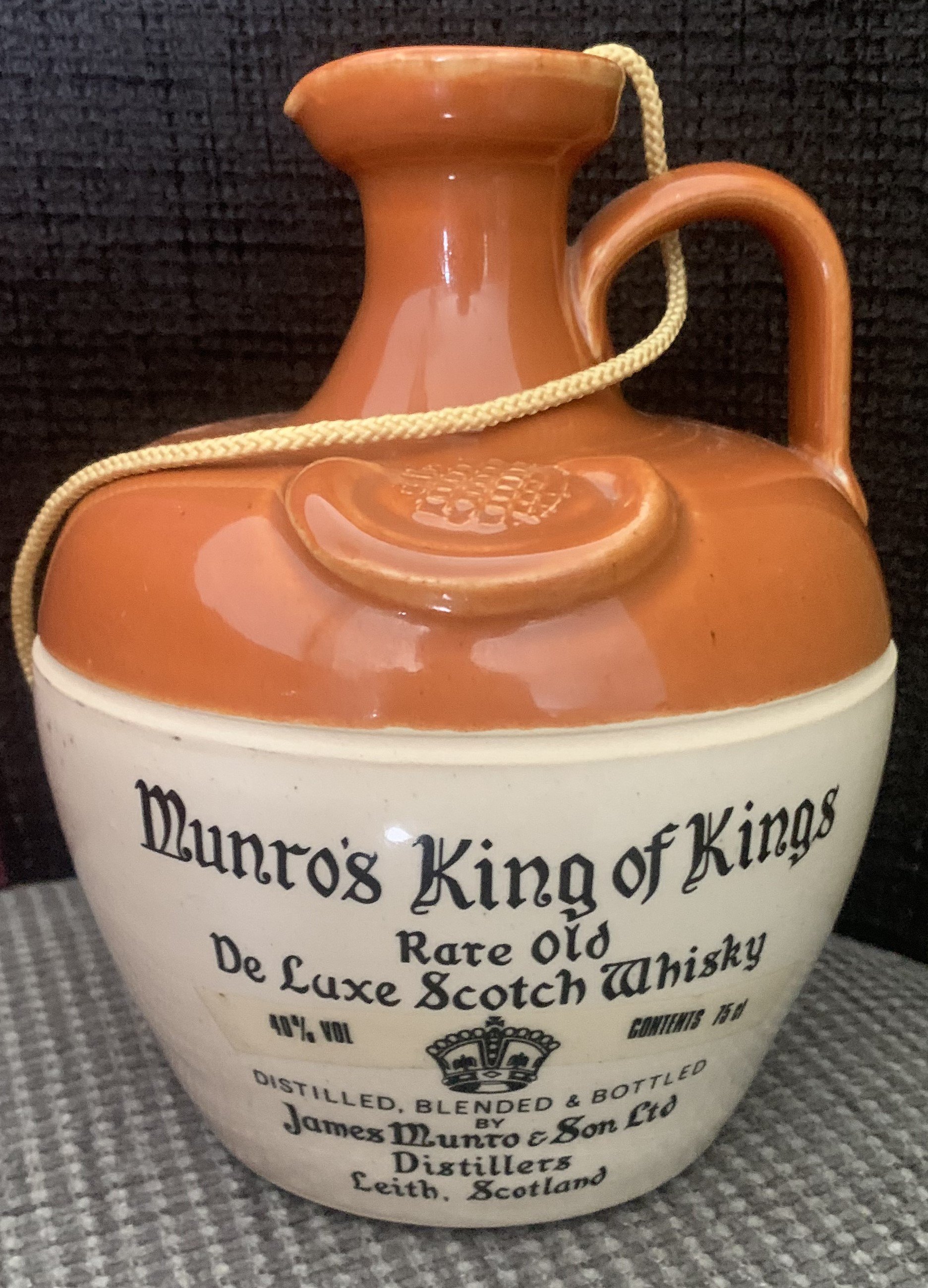 John Lyalls Bells Whisky Football Gifts: Munros King Of Kings Rare Old De Luxe Scotch Whisky (40 per cent) and a further labelled Bonnyrigg Wembley Club 1954-1979 (70 per cent with scuffing to label). Given to Lyall by his mentor Ron Greenwood but it is unknown how it was obtained and why it was passed on.